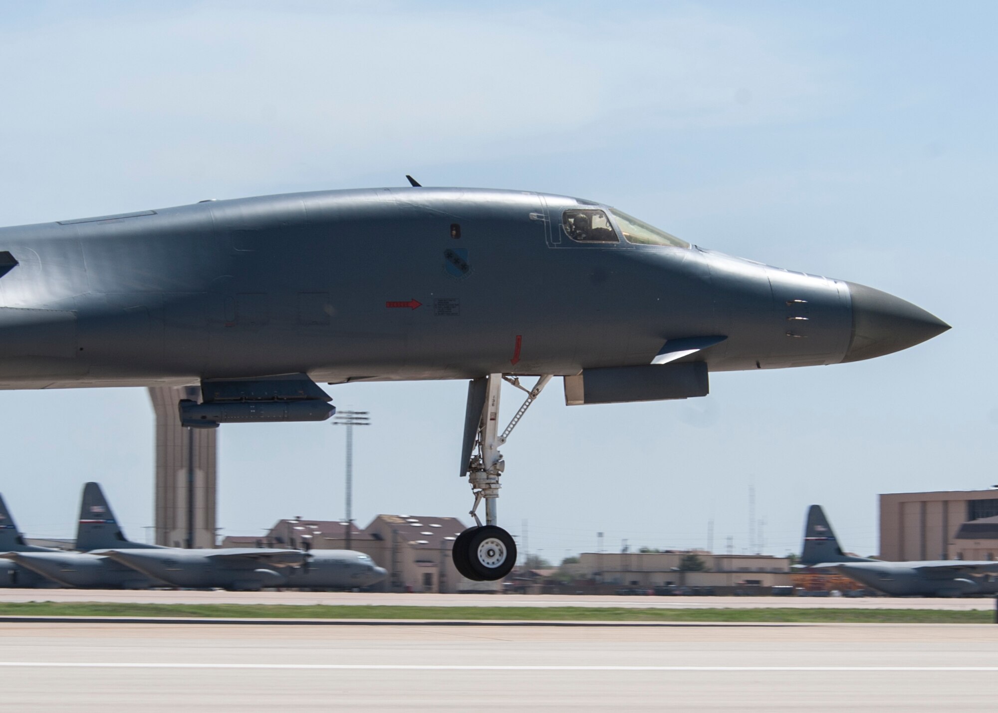 A B-1 Bomber from the 9th Bomb Squadron conducts its first sortie while employing the Sniper Advanced Targeting Pod-Sensor Enhancement modification April 15, 2013, at Dyess Air Force Base, Texas. Significantly enhancing a B-1s targeting capability, the new Sniper-SE pod provides aircrew with an even greater capability via new enhanced sensors, a two-way data link, advanced processors and automated non-traditional intelligence, surveillance and reconnaissance modes. (U.S. Air Force photo by Airman 1st Class Peter Thompson/Released)