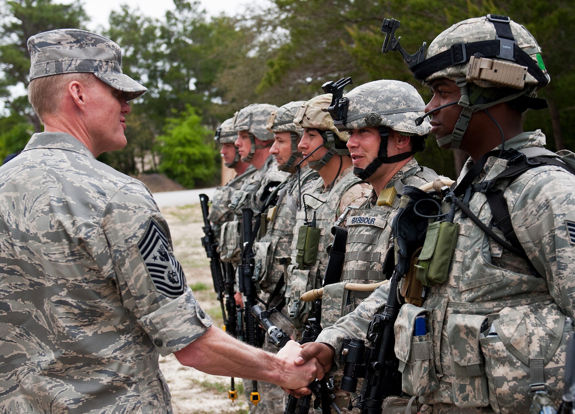 Chief Master Sgt. of the Air Force James Cody meets with security forces Airmen participating in pre-deployment training during his visit to Eglin Air Force Base, Fla.  Cody visited various facilities and met with Airmen across the base on his first trip to Eglin since becoming CMSAF.  The Brave Defender deployment training is one of four security forces training facilities in the Air Force.  It is managed by the 96th Ground Combat Training Squadron.  (U.S. Air Force photo/Samuel King Jr.)