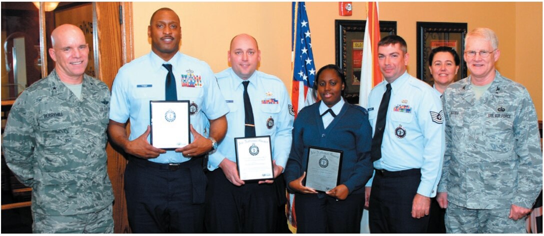 Brig. Gen. Steven Berryhill, Ala. ANG Commander, ackowledges members of the 187th Fighter Wing Recruiting Office: Master Sgt. James Tyner, Recruiting Office Supervisor, Tech. Sgt. Todd Silvers, Tech. Sgt. Vannisha Howard and Tech. Sgt.Marcus Milford. Senior Master Sgt. Cynthia Young, Ala. Recruiting and Retention Superintendent, and Col Paul Jacobs , Ala. ANG Director of Staff-Air, were also present. (U.S. Air National Guard photo)