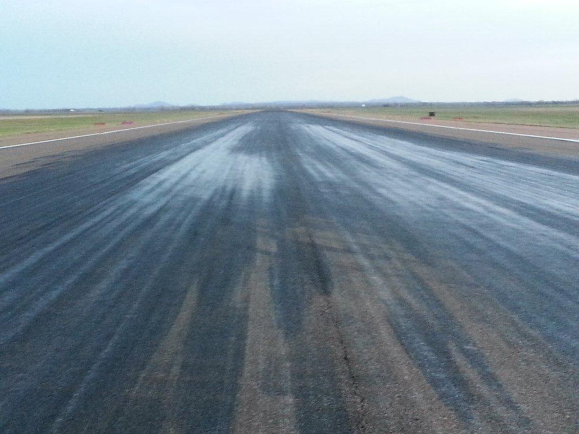 ALTUS AIR FORCE BASE, Okla. – An image of the Assault Strip before the rubber buildup was removed, April 14. (Courtesy photo)