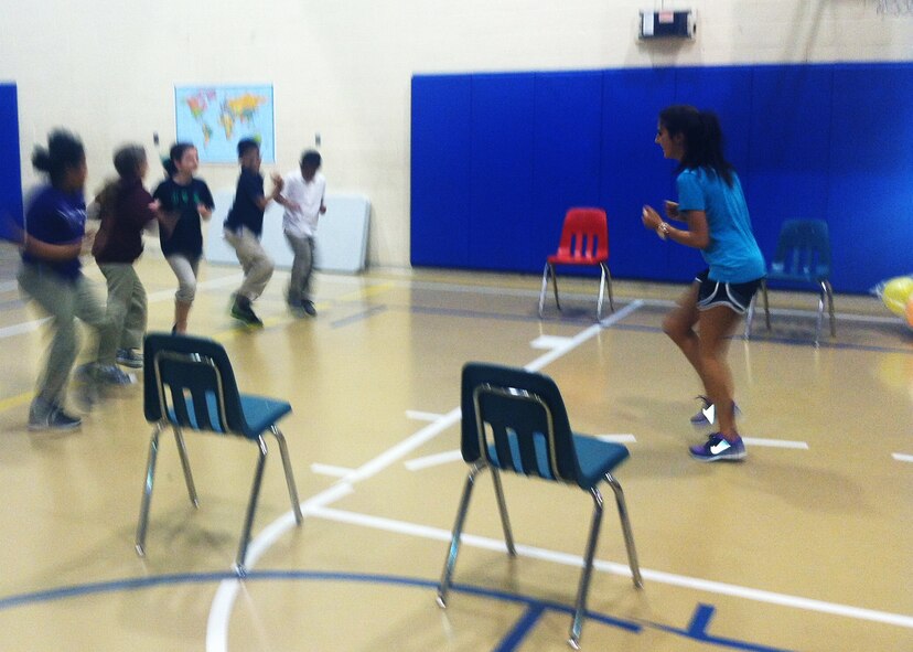 Leah Fortunato works out with kids from the Barksdale Youth Center. (Col.Paul Fortunato/Courtesy)
