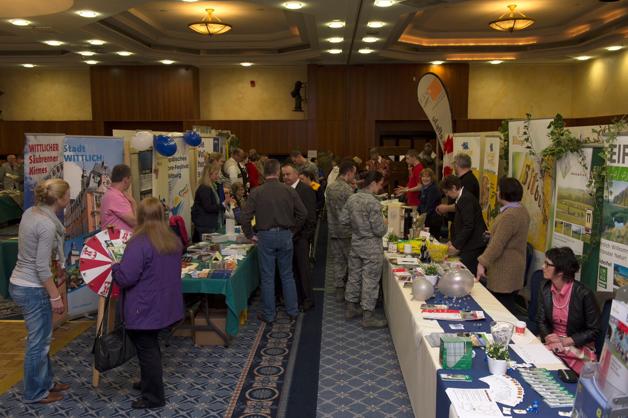 SPANGDAHLEM AIR BASE, Germany -- Spangdahlem Airmen and community members attend the ninth annual Explore the Eifel information fair April 19, 2013. More than 60 vendors attended the event to show community members what activities and products the Eifel region has to offer. (U.S. Air Force photo by Senior Airman Natasha Stannard/Released)