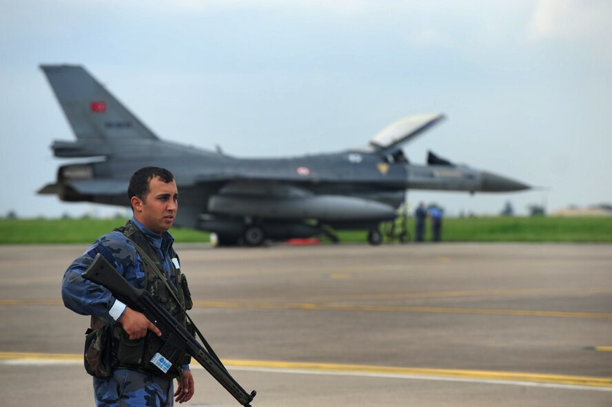 Members of the Turkish air force conduct an aircraft exercise April 11, 2013, at Incirlik Air Base, Turkey. The 39th Air Base Wing Safety office assisted during the scenario that simulated a broken landing gear on an F-16 aircraft. (U.S. Air Force photo by Senior Airman Anthony Sanchelli/Released)