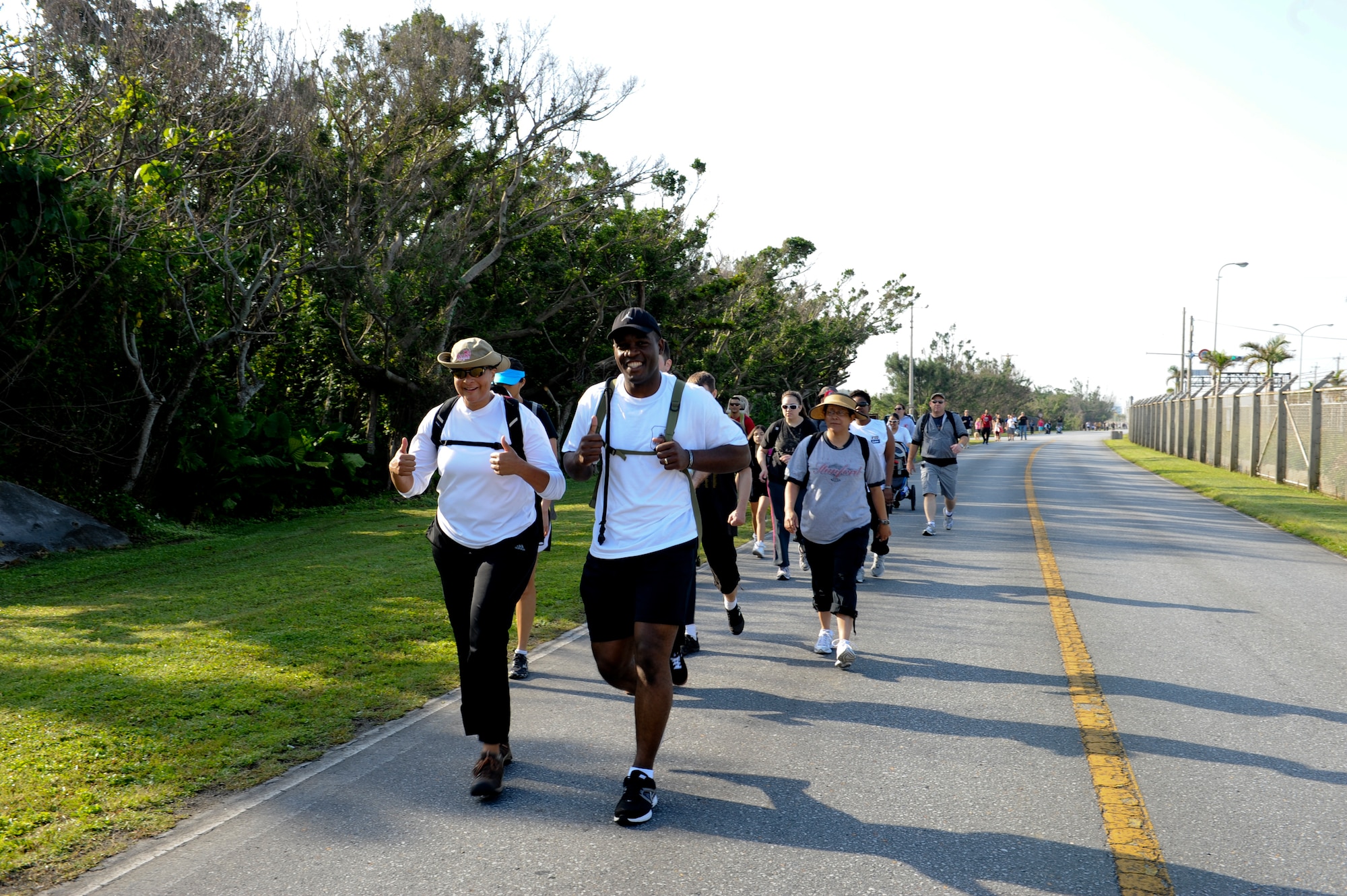 Participants of the 2013 Bataan Memorial march, embarked on the 8.5 mile trail on Kadena Air Base, Japan, April 13, 2013. The event to honored the more than 60,000 U.S. and Filipino troops who surrendered to the Japanese after the three-month Battle of Bataan on April 9, 1942, in the Bataan province on the islands of Luzon, Corregidor, and the harbor defense forts of the Philippines. (U.S. Air Force photo by Airman 1st Class Keith A. James/Released)