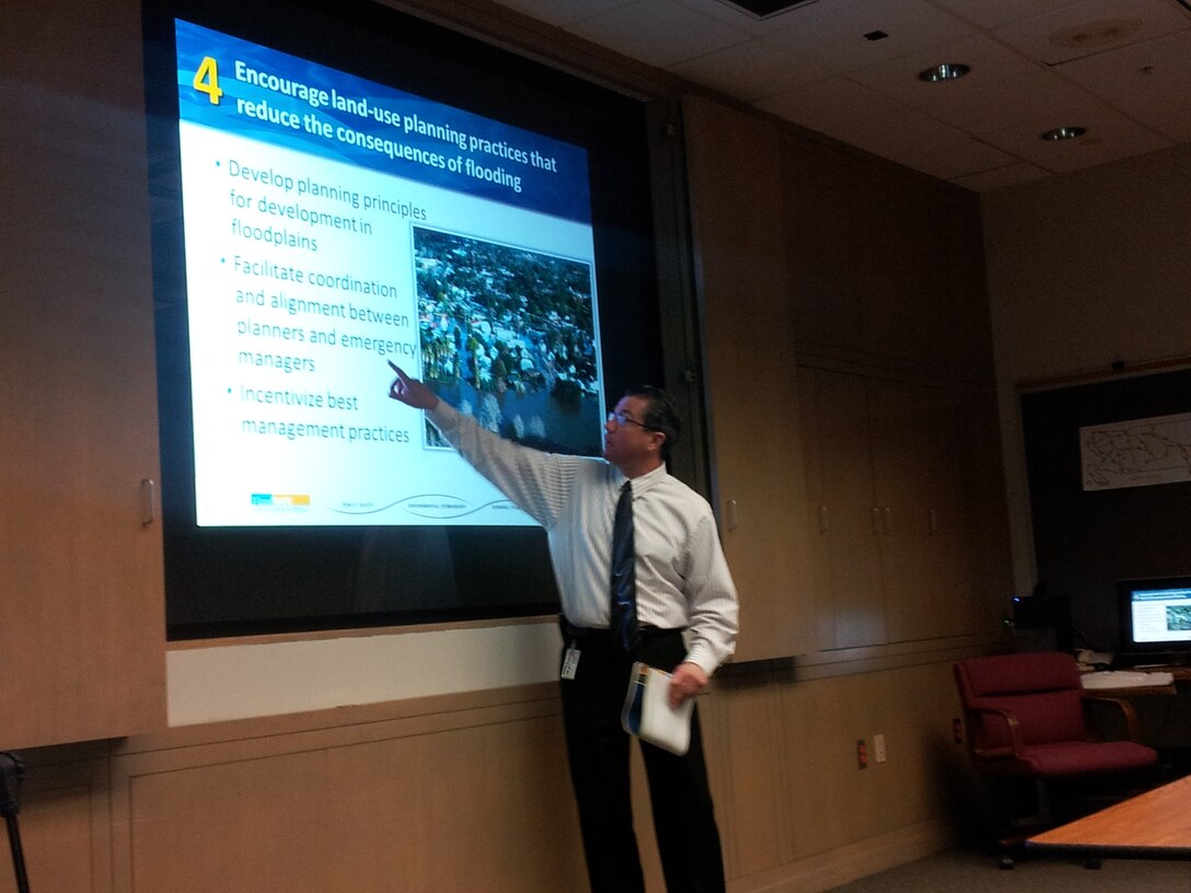 Kim Gavigan, the chief of the water resources planning section for the Los Angeles District’s Arizona Area Office, presents information from California's Flood Future report, the draft of which was released to public April 3.  Gavigan and representatives of the California Department of Water Resources conducted nine public meetings to educate flood management agency representatives on the report's findings as well as to receive feedback about unique flood management concerns at local levels.