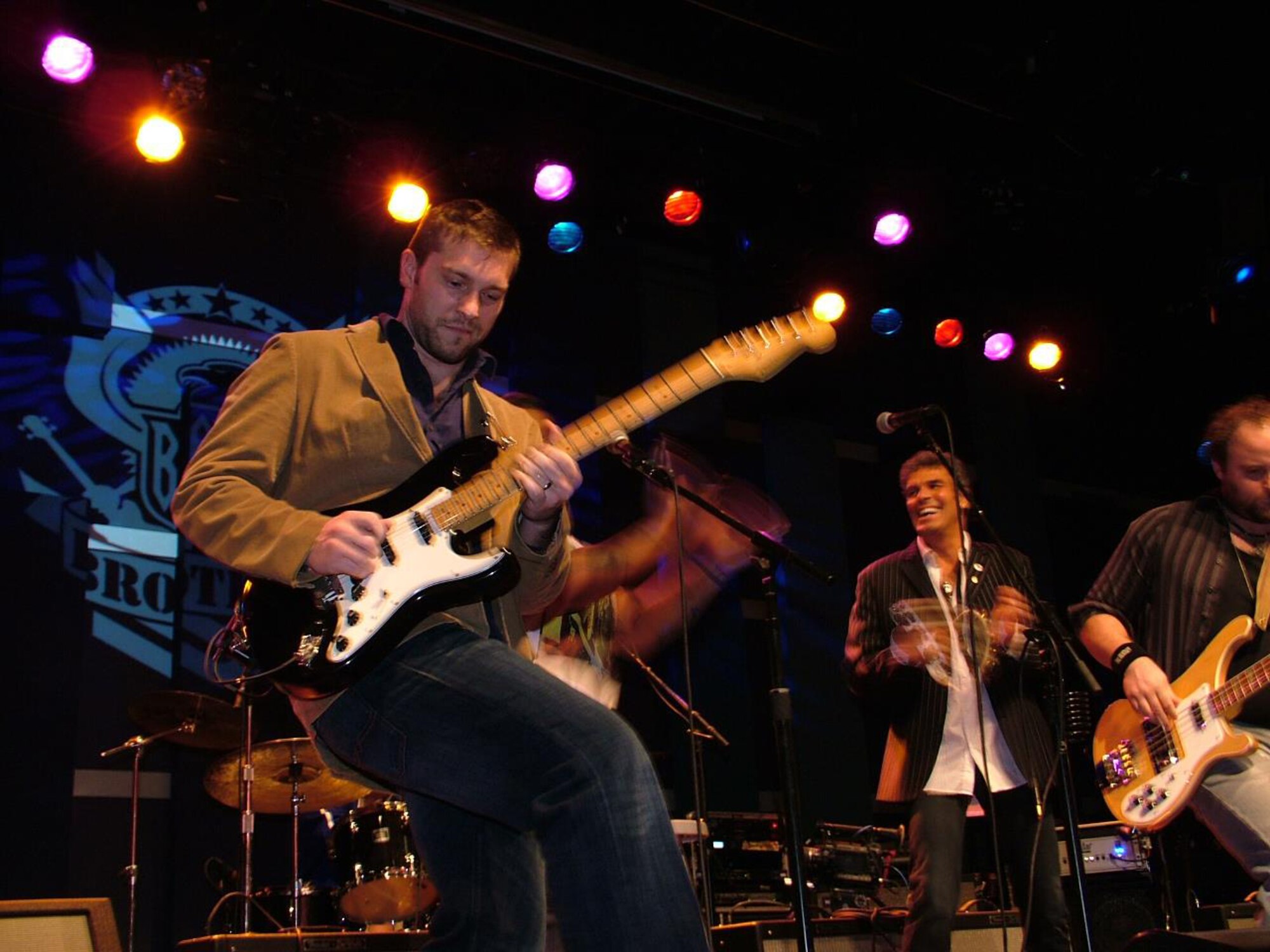 Tech. Sgt. Brian McNally, a guitarist for the Air National Guard Band of the Mid-Atlantic plays with fellow veteran band mates of Bands of Brothers TV at the Bands of Brothers benefit concert, Nov. 12, 2012 at World Café Live, Philadelphia. The benefit concert was the finale show for 12 veterans who were brought together to form three bands that were filmed as part of a 10-episode online reality TV series. Bands of Brothers is a nonprofit organization that raises money for research and treatment in a dedicated effort of shedding light on post-traumatic stress disorder (Photo by Sheila McNally).