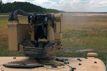 Marines with Combat Logistics Battalion 6, 2nd Marine Logistics Group fire the M153 Common Remotely Operated Weapon Station with a .50 Caliber machine gun attached during a training exercise aboard Camp Lejeune, N.C., April 18, 2013. The CROWS allows the servicemember to remain protected in a military vehicle and fire at the enemy while still maintaining positive identification on the target. 