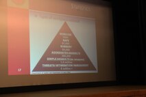 A slide listing workplace-related crime rates helps inform Marines and sailors about the instances of violent behavior at work during a violence prevention course aboard Camp Lejeune, N.C., April 17, 2013. The program’s instructors informed the participants that the numbers only included reported incidents, or roughly one-third of the total crimes. 