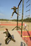 International military members tackle the land obstacle course at the 2008 Interallied Confederation of Reserve Officers (CIOR) Military Pentathlon Competition held in Istanbul, Turkey, July 4-13.