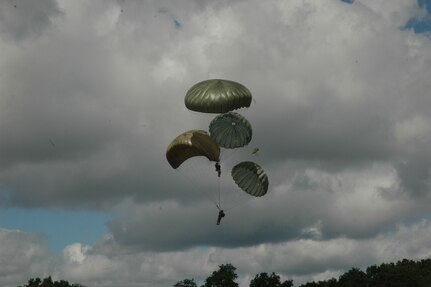 Two Soldiers from Fort Campbell, Ky., landed safely in Kingston, R.I., on Aug. 9 after their main parachutes became tangled while participating in Leapfest, the National Guard's international military parachute competition. Sergeants 1st Class Christopher O'Malley and Kurt Merrell resorted to their training and deployed their reserve parachutes.