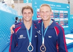 Troy, left, and 1st Lt. Justin Dumais of the South Carolina Air National Guard finished sixth in the men's synchronized three-meter springboard diving event in the 2004 Olympics in Athens. This year, Dumais is an F-16 student in the Night Systems Training Course at Luke Air Force Base in Arizona. And his younger brother is in Beijing alone.