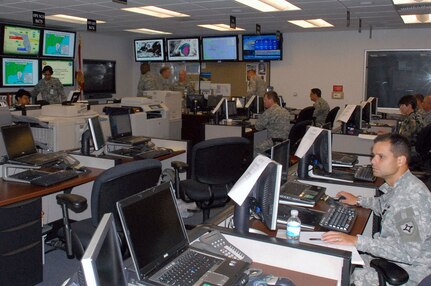 Members of the Florida National Guard prepare for a shift change at the Joint Emergency Operations Center in St. Augustine. The center has been supporting operations in advance of Tropical Storm Fay since Florida Gov. Charlie Crist signed an executive order on Saturday.