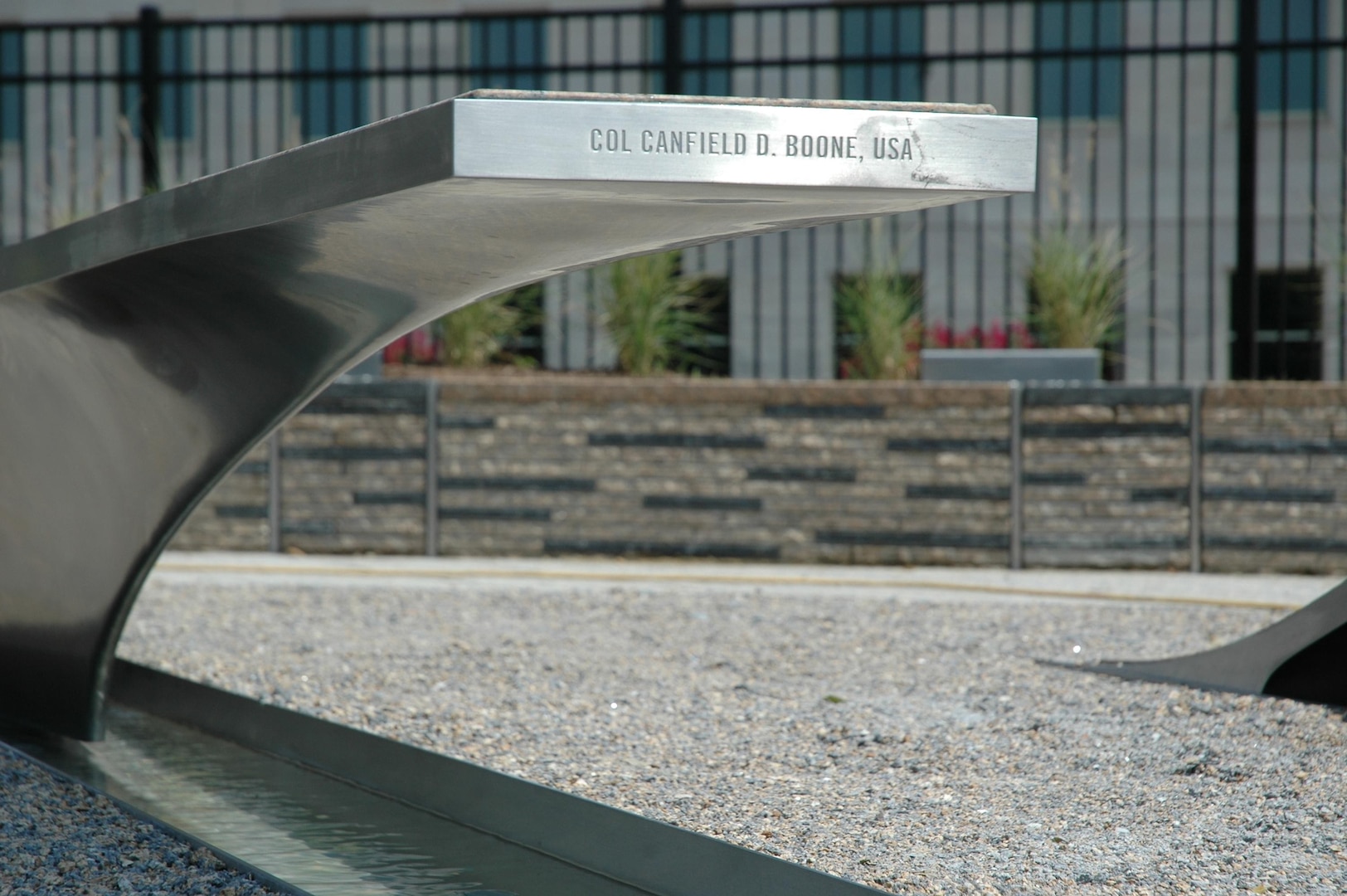 The Pentagon Memorial benches are arranged according to the victims' ages and where they were during the crash. Col. Canfield Boone of the Indiana Army National Guard and Chief Warrant Officer 4 William Ruth of the Maryland Army National Guard were killed at the Pentagon on Sept. 11, 2001. The benches representing the 125 lives lost in the Pentagon are positioned so that the Pentagon is in the background view of a visitor reading the victim's name.