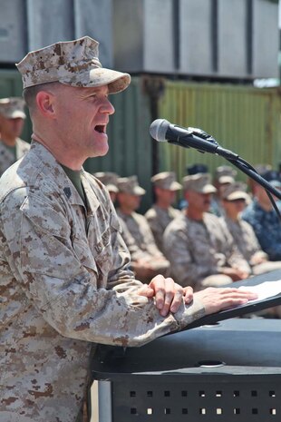 First Sgt. Bradley Simmons speaks to Combat Logistics Battalion 15, 15th Marine Expeditionary Unit, during the relief and appointment ceremony on the flight deck of USS Rushmore, April 13. The ceremony welcomed Sgt. Maj. JohnPaul Doring and bid farewell to Simmons. The 15th MEU is comprised of approximately 2,400 Marines and sailors and is deployed as part of the Peleliu Amphibious Ready Group. Together, they provide a forward-deployed, flexible sea-based Marine Air Ground Task Force capable of conducting a wide variety of operations ranging from humanitarian aid to combat. (U.S. Marine Corps photo by Cpl. Timothy Childers/Released)