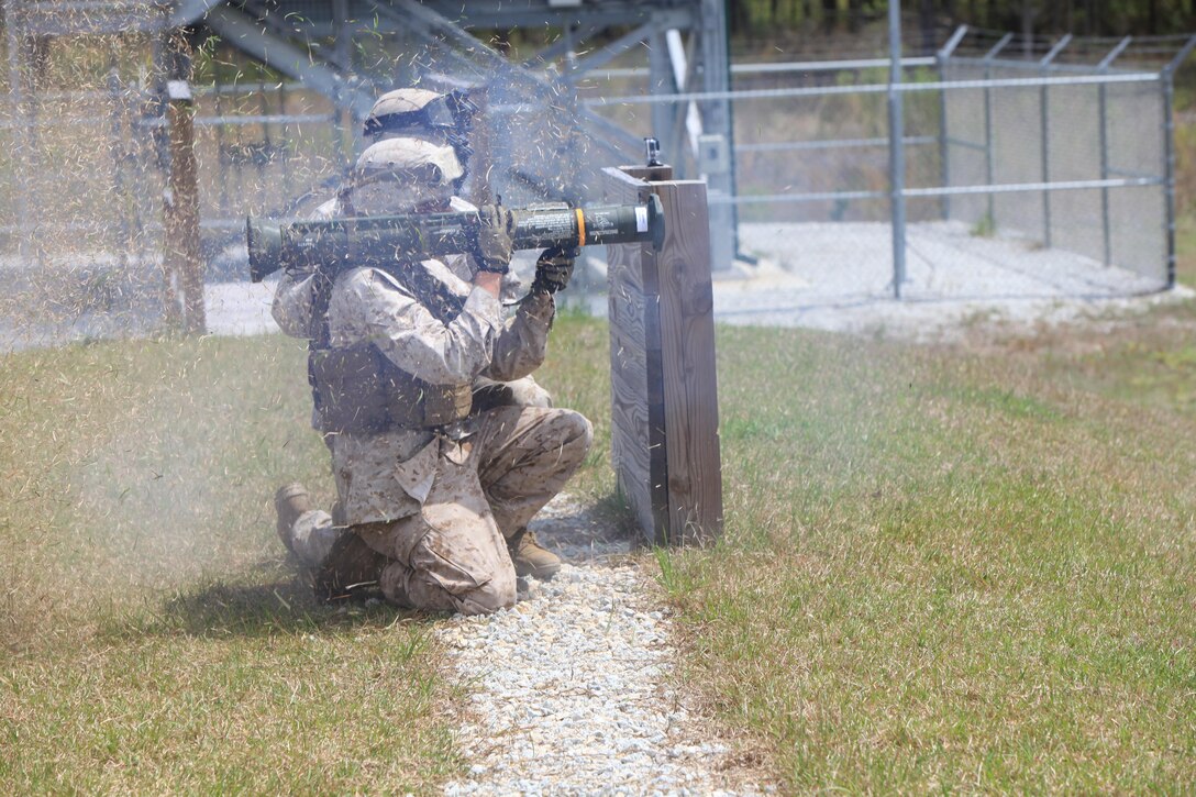 Lance Cpl. Christopher Ott, a driver with Bravo Company, fires an AT-4 rocket launcher at a dummy tank target. Marines and sailors from Bravo Company, 2nd Light Armored Reconnaissance Battalion, 2nd Marine Division, shot shoulder-launched multipurpose assault weapon and AT-4 rocket launchers a part of their training April 17, 2013.