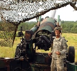 Staff Sgt. Crooks prepares to fire a final ceremonial howitzer round while the Battery C, 2nd Battalion, 123rd Field Artillery performed Annual Training at Fort McCoy, Wis. in July 2008.