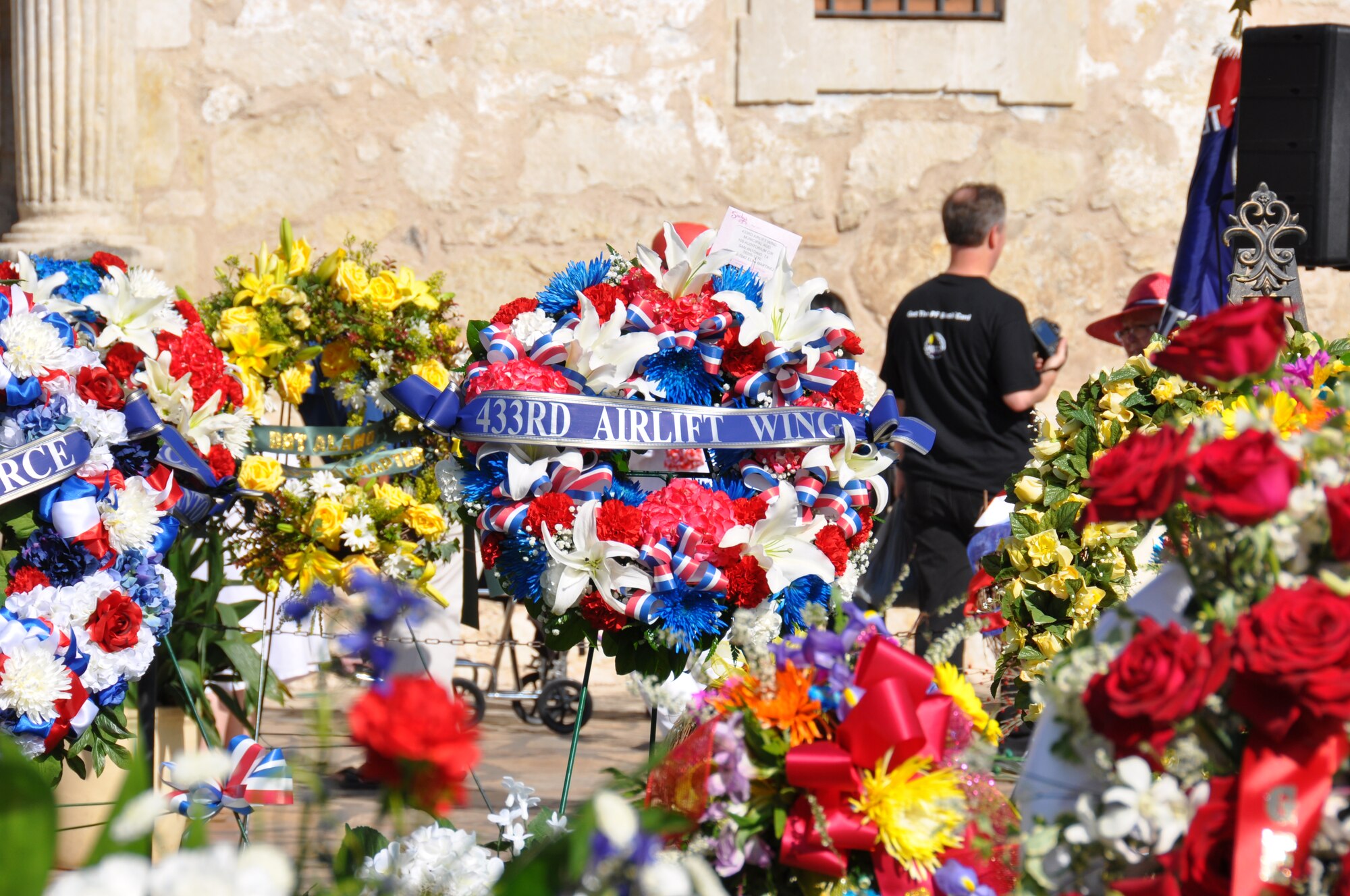 The 433rd Airlift Wing paid tribute to Texian heroes by placing a wreath of flowers in the front of the Texas shrine in downwton San Antonio as part of the annual Fiesta festivities on April 22. (U.S. Air Force Photo by Tech Sgt. Carlos J. Trevino)