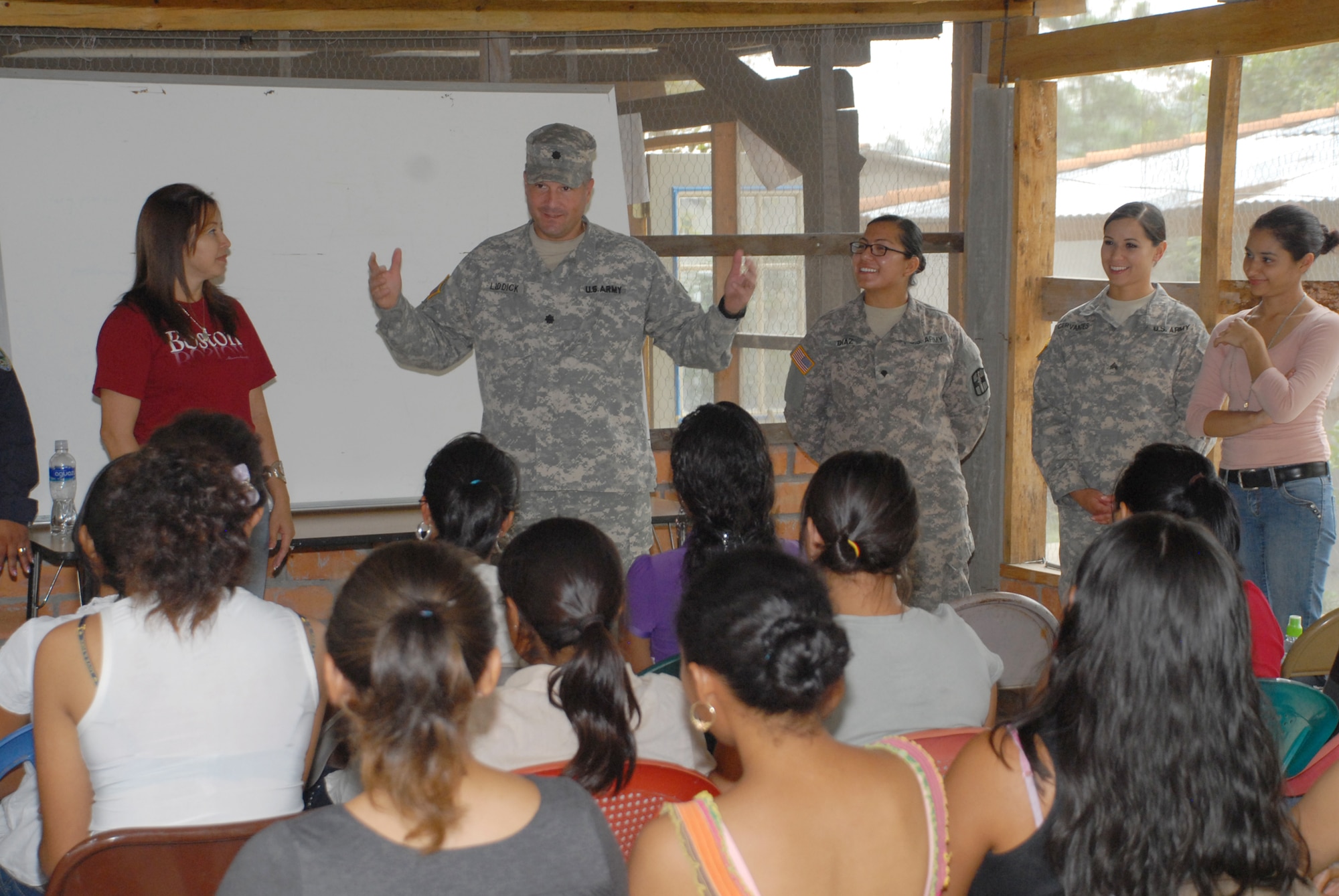 U.S. Army Lt. Col. Jay Liddick, Army Forces Battalion commander, speaks to the students attending the Arts for Humanity Leadership Center as part of Joint Task Force-Bravo's commitment to building partner capacity. The leadership center is designed to empower women to be leaders and entrepreneurs in their communities. (Air Force photo by Maj. Angelic Dolan)