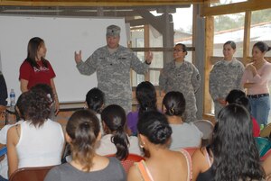 U.S. Army Lt. Col. Jay Liddick, Army Forces Battalion commander, speaks to the students attending the Arts for Humanity Leadership Center as part of Joint Task Force-Bravo's commitment to building partner capacity. The leadership center is designed to empower women to be leaders and entrepreneurs in their communities. (Air Force photo by Maj. Angelic Dolan)