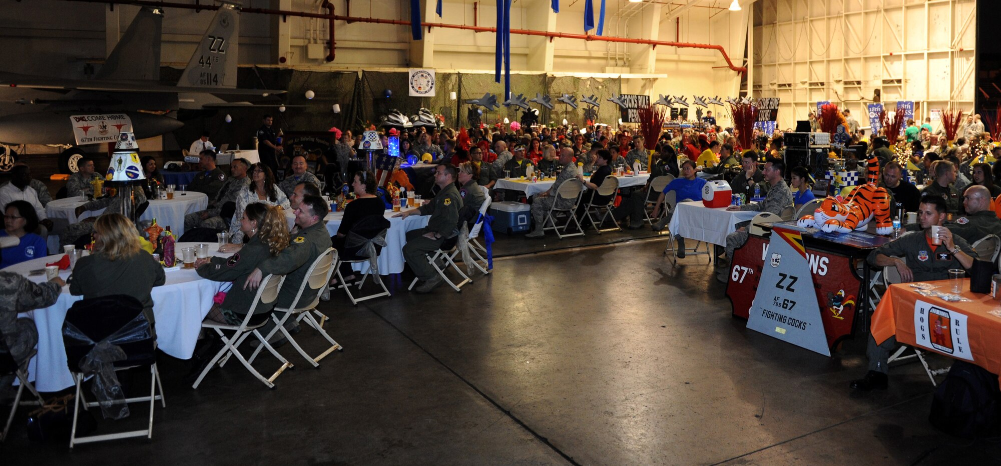 The 18th Operations Group hosted a Warrior Banquet on Kadena Air Base, Japan, April 19, 2013. This banquet was held to honor the accomplishments of 18th Operations Group personnel in 2012. 18th OG personnel also participated in a spirit award contest, and enjoyed dinner with fellow Airmen. (U.S. Air Force photo by Airman 1st Class Hailey R. Davis/Released)