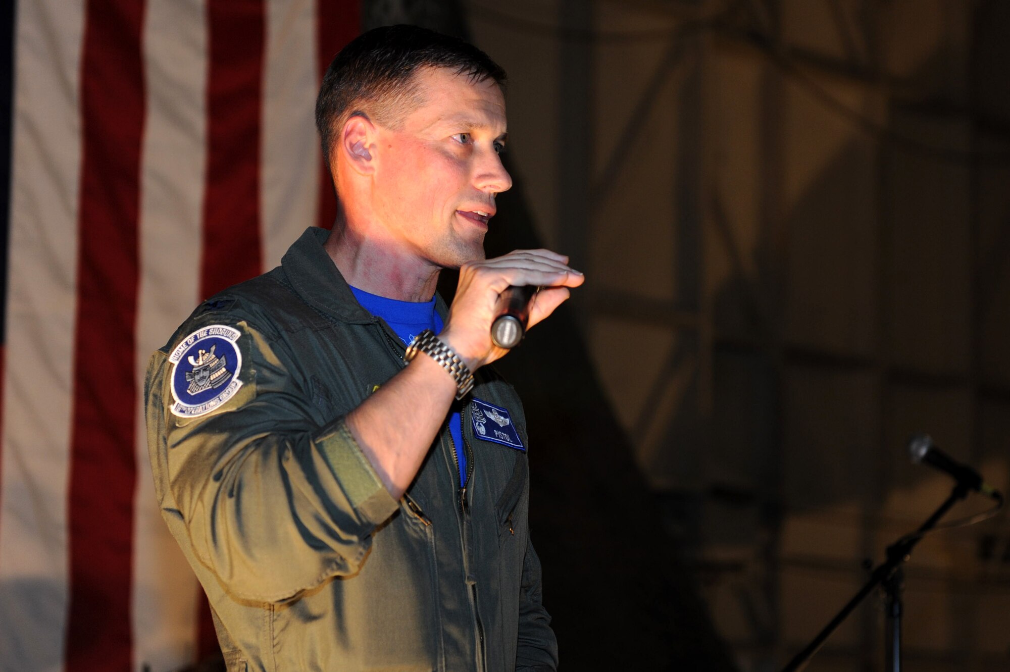 U.S. Air Force Col. Pete Milohnic, 18th Operations Group commander, gives opening remarks at the Warrior Banquet on Kadena Air Base, Japan, April 19, 2013. This banquet was held to honor the accomplishments of 18th OG personnel in 2012. (U.S. Air Force photo by Airman 1st Class Hailey R. Davis/Released)