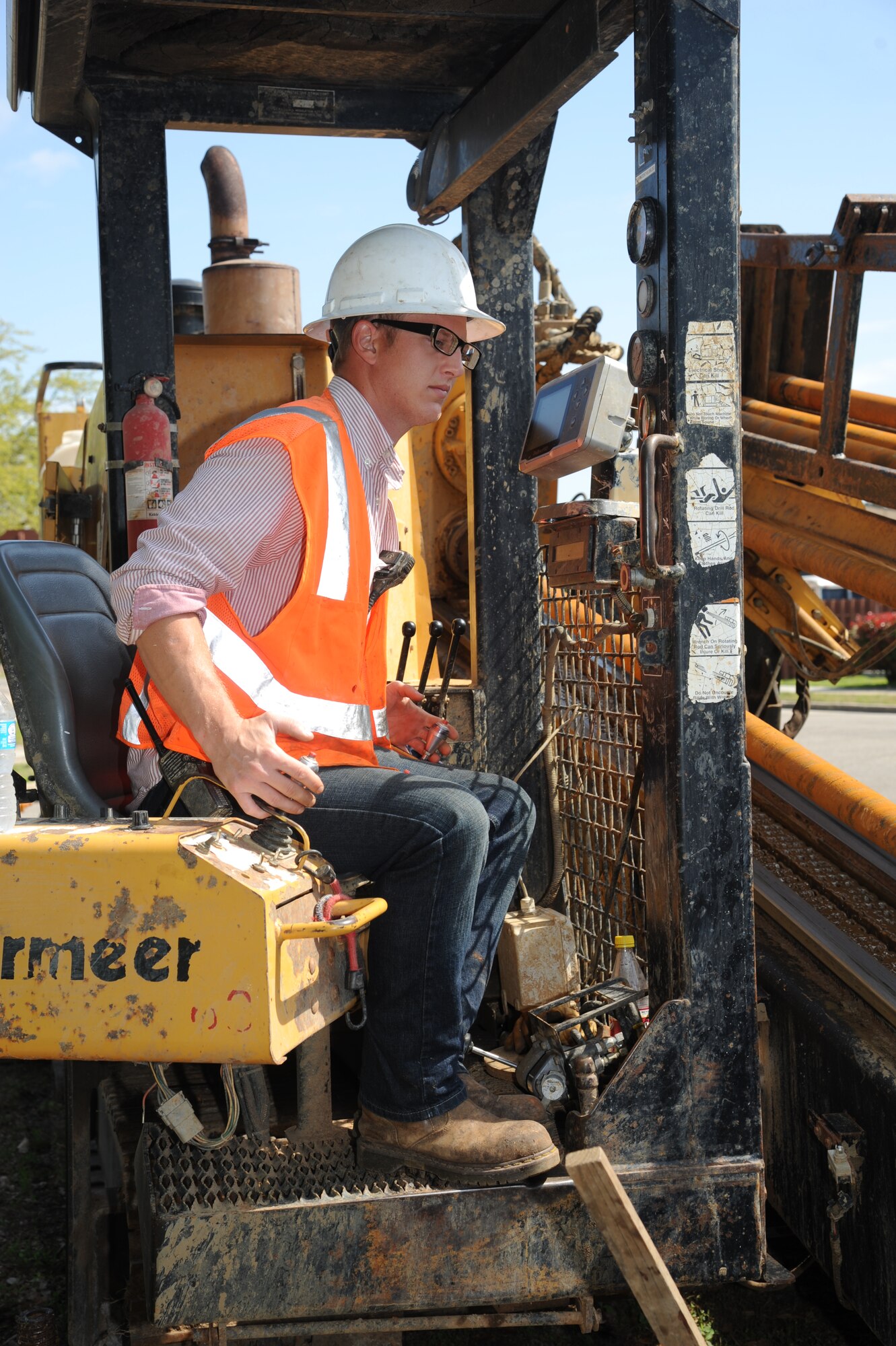 Chad Mawer, Green-Simmons Company contractor, operates a driller for boring a hole for gas line installation April 22, 2013, on the corner of X Street and L Street at Keesler Air Force Base, Miss.  The 11-month project to upgrade the natural gas distribution system at Keesler will touch every corner of the installation and end mid-December.  (U.S. Air Force photo by Kemberly Groue)