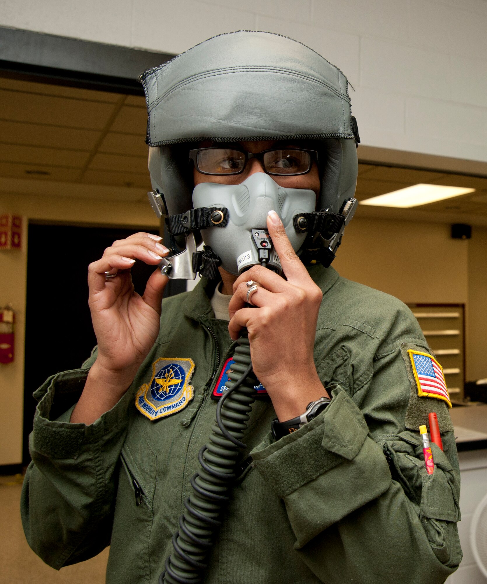Senior Airman Vanya Cook-Leotaud, 349th Air Refueling Squadron boom operator, performs a pre-flight oxygen check April 22, 2013, McConnell Air Force Base, Kan. In addition to her regular duties as a boom operator, Cook-Leotaud is responsible for ensuring that her gear functions and fits properly to avoid potential problems. She was selected as the 22nd Air Refueling Wing spotlight performer for the week of April 8 to 12, 2013. (U.S. Air Force photo/Airman 1st Class Victor J. Caputo)