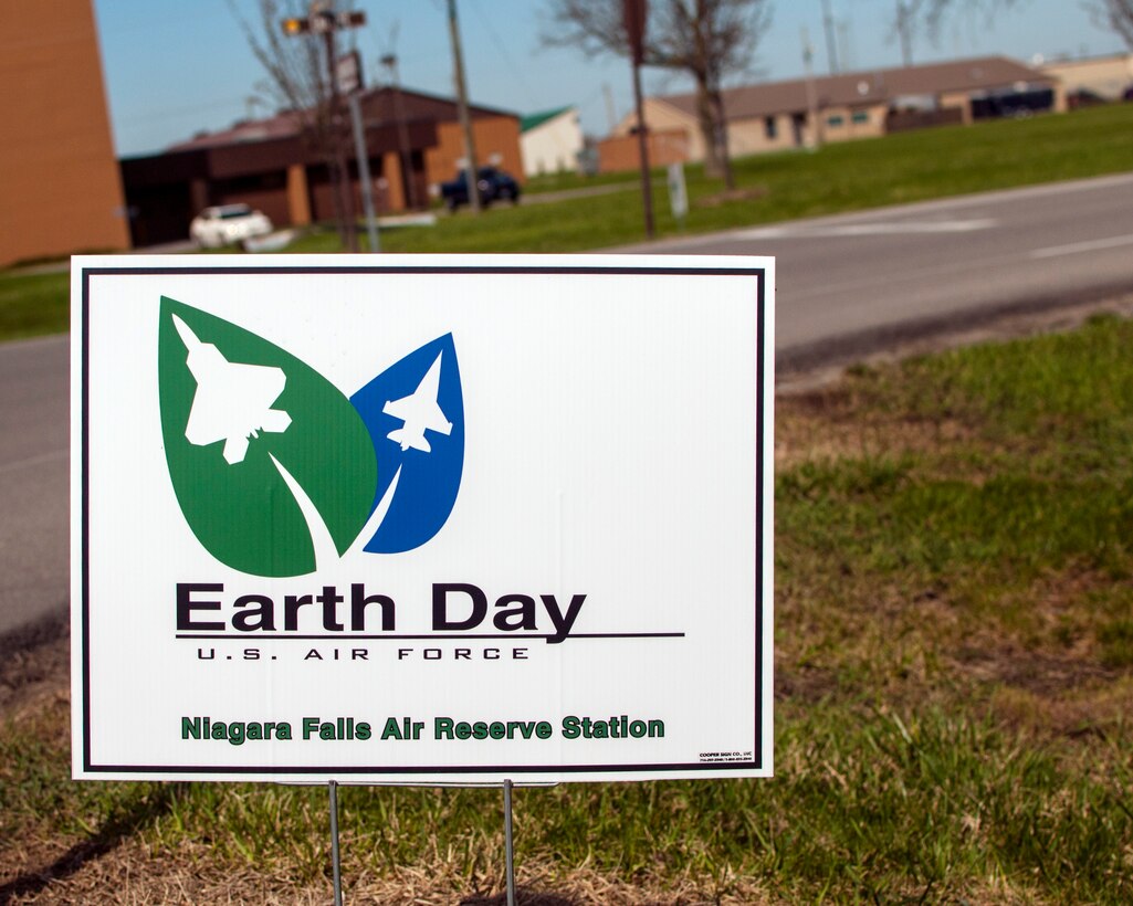 A sign proclaiming Earth Day is placed on the Niagara Falls Air Reserve Station, N.Y., April 22, 2013.  NFARS contributes on Earth Day and throughout the year by recycling many materials such as paper, cardboard, scrap metal, toner cartridges, computers, monitors, printers, other electronic waste, appliances, pallets, wood scraps, plastic wrap, plastic and glass beverage containers, batteries, used oil and filters, paint, light bulbs, ballasts and other recyclable construction and demolition debris. (U.S. Air Force photo by Tech. Sgt. Joseph McKee)