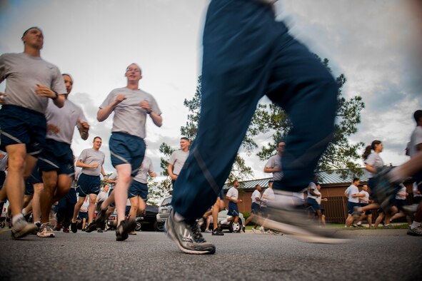 Team Moody members participate in a 5K run April 19, 2013, at Moody Air Force Base, Ga. The event also featured an information fair that showcased Integrated Delivery System programs. (U.S. Air Force photo by Staff Sgt. Jamal D. Sutter/Released) 
