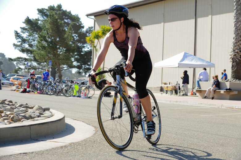 VANDENBERG AIR FORCE BASE, Calif. – Naomi McDaniel wife of Maj. Rodney McDaniel, 9th Space Operations Squadron Executive Officer, begins the 12 km bicycle portion of the 30th Force Support Squadron’s duathalon here Saturday, April 20, 2013. The duathalon consisted of a 5 km run, a 12 km bike and a 5 km run. (U.S. Air Force photo/Senior Airman Lael Huss)

