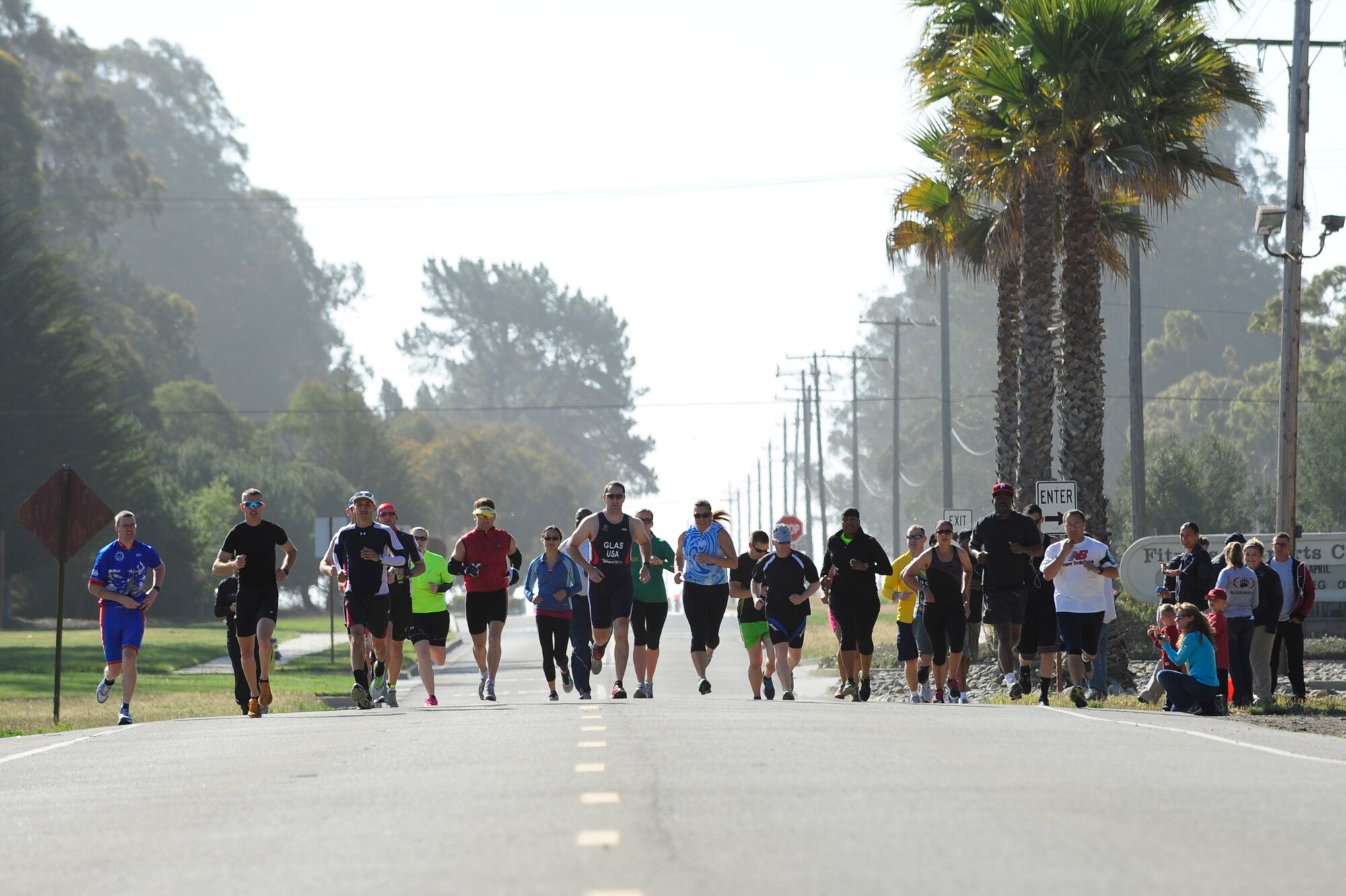 VANDENBERG AIR FORCE BASE, Calif. – And they’re off! Team V members begin the first section of a duathalon here Saturday, April 20, 2013. The duathalon, sponsored by the 30th Force Support Squadron, consisted of a 5 km run, a 12 km bike and a 5 km run. (U.S. Air Force photo/Senior Airman Lael Huss)