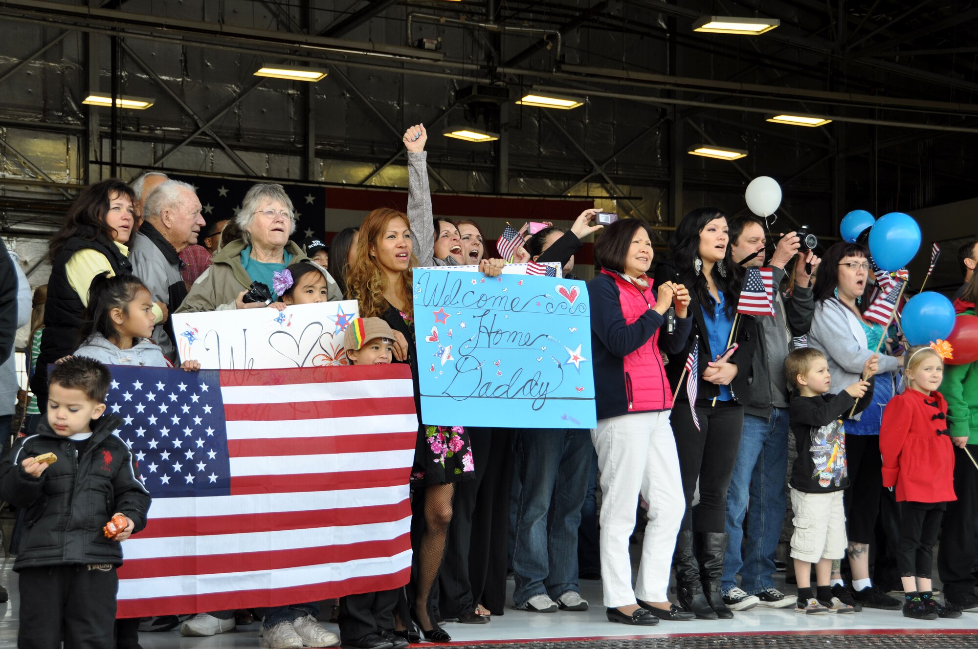 Family and friends await the arrival of about 150 Airmen from the 419th and 388th Fighter Wings returning home from Kunsan Air Base, Republic of Korea today.