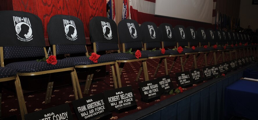 A row of empty chairs are displayed during the 35th Annual Prisoner of War/Missing in Action Luncheon on Barksdale Air Force Base, La., April 19, 2013. The chairs represent those individuals still missing in action. (U.S. Air Force photo/Senior Airman Sean Martin)