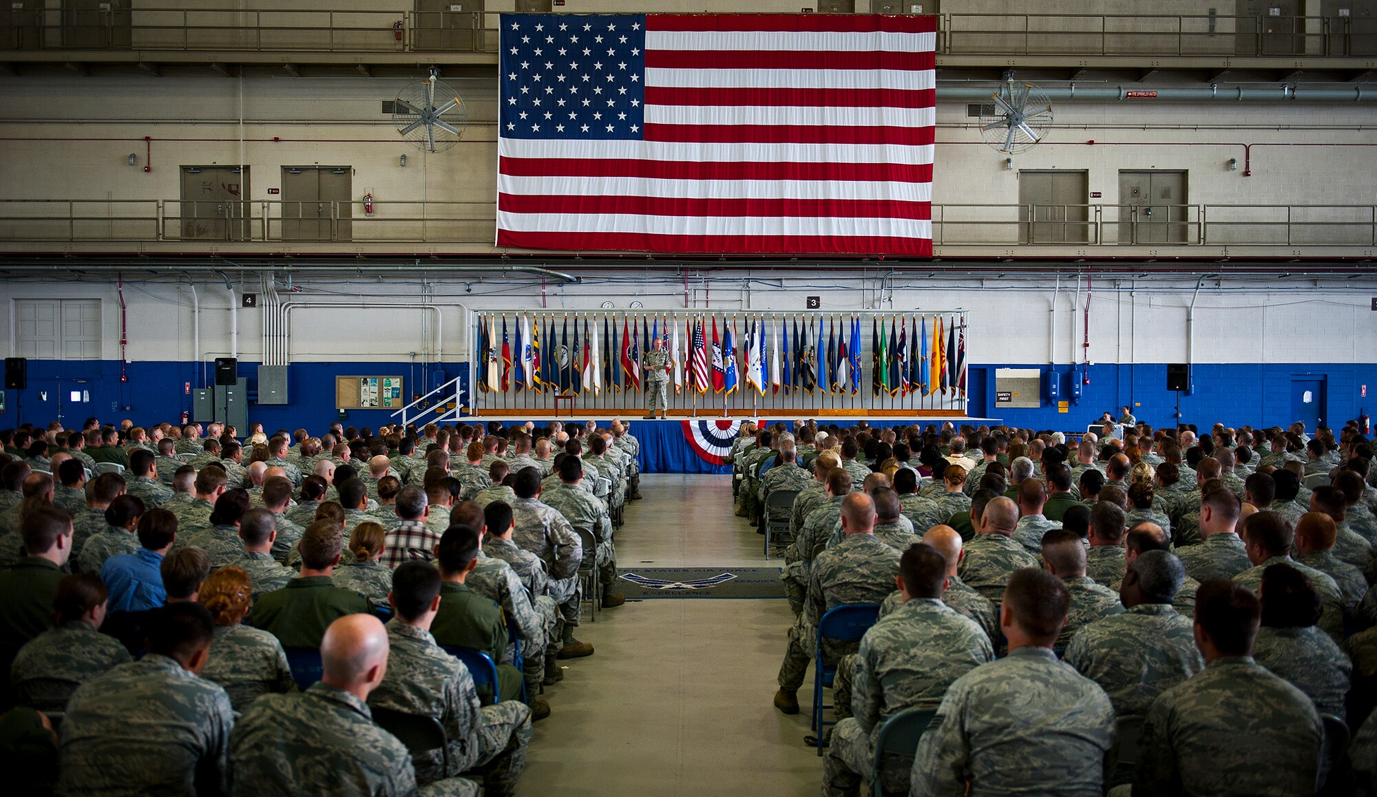 Chief Master Sgt. of the Air Force James Cody speaks to the crowd at his Airmen’s Call April 19 during his visit to Eglin Air Force Base, Fla.  Cody visited various facilities and met with Airmen across the base on his first trip to Eglin since becoming CMSAF.  During the Chief’s Call, he addressed tuition assistance, furloughs, pay raises, promotion rates and cyber defense.  (U.S. Air Force photo/Samuel King Jr.)
