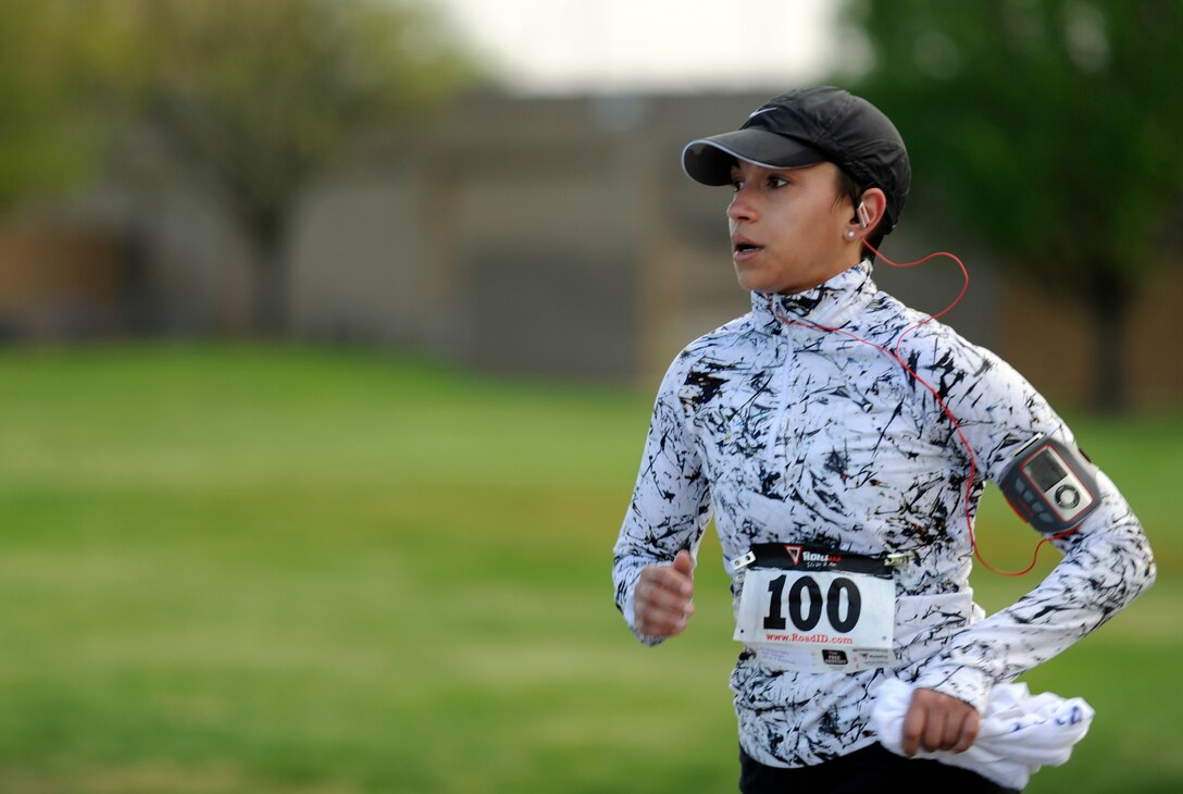 A half marathon participant finishes the last leg of the race April 13, 2013 at Joint Base Andrews, Md. A half marathon is 13.1 miles. (U.S. Air Force photo/Staff Sgt. Brittany E. Jones)