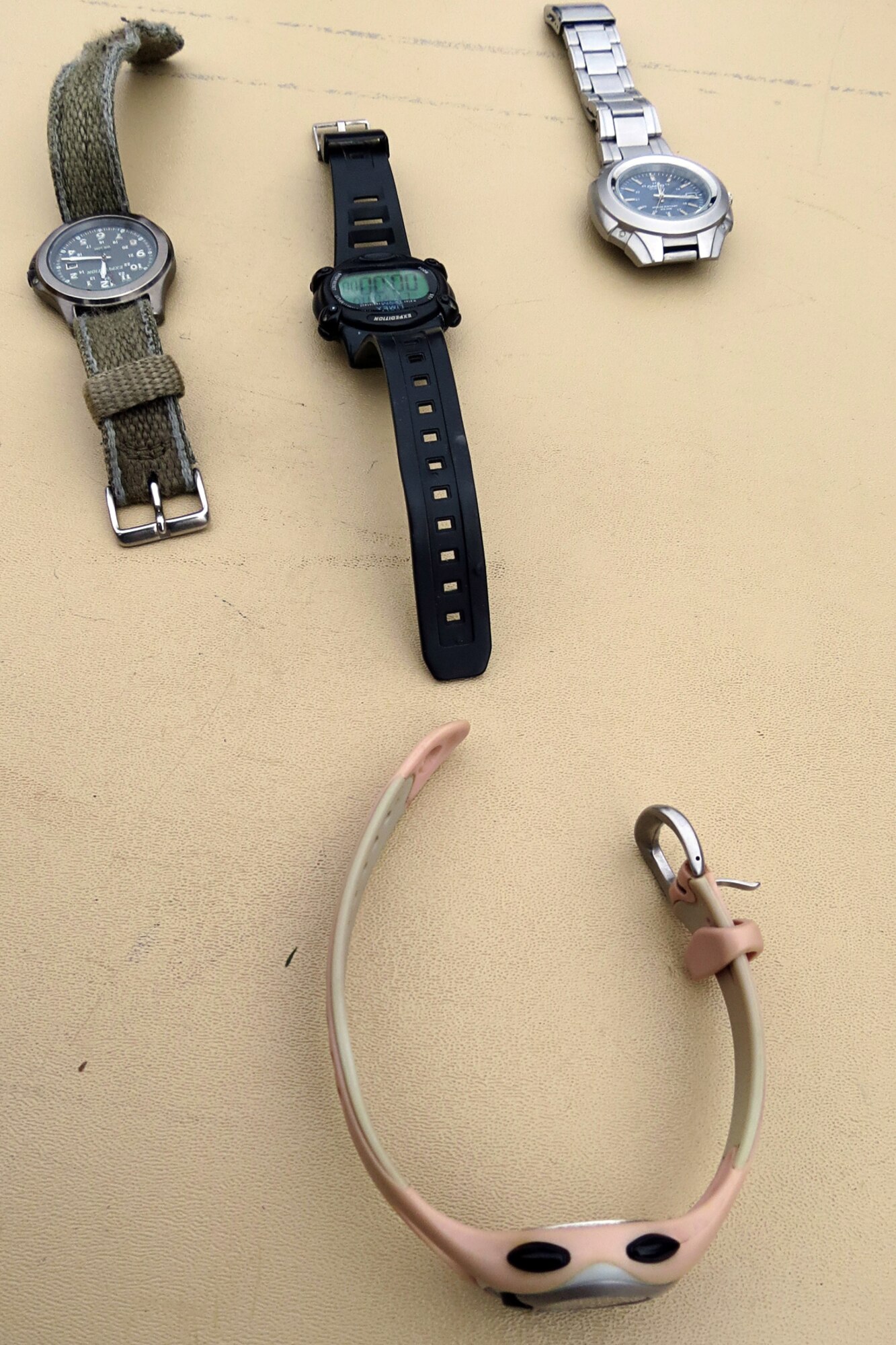 GRISSOM AIR RESERVE BASE, Ind. -- Confiscated watches rest on a table at the start/finish line of a predict-a-time 5k run at the Grissom Fitness Center here April 16. Competitors had to predict their finishing times and run without the aid of timing devices. (U.S. Air Force photo/Becca Hammer)