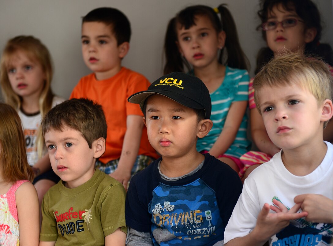 Children from the NASA Child Development Center participate in a fire safety demonstration at Langley Air Force Base, Va., April 17, 2013. Children need proper emergency training so they are prepared and know what to do if the need arises.  (U.S. Air Force photo by Senior Airman Kayla Newman/Released)