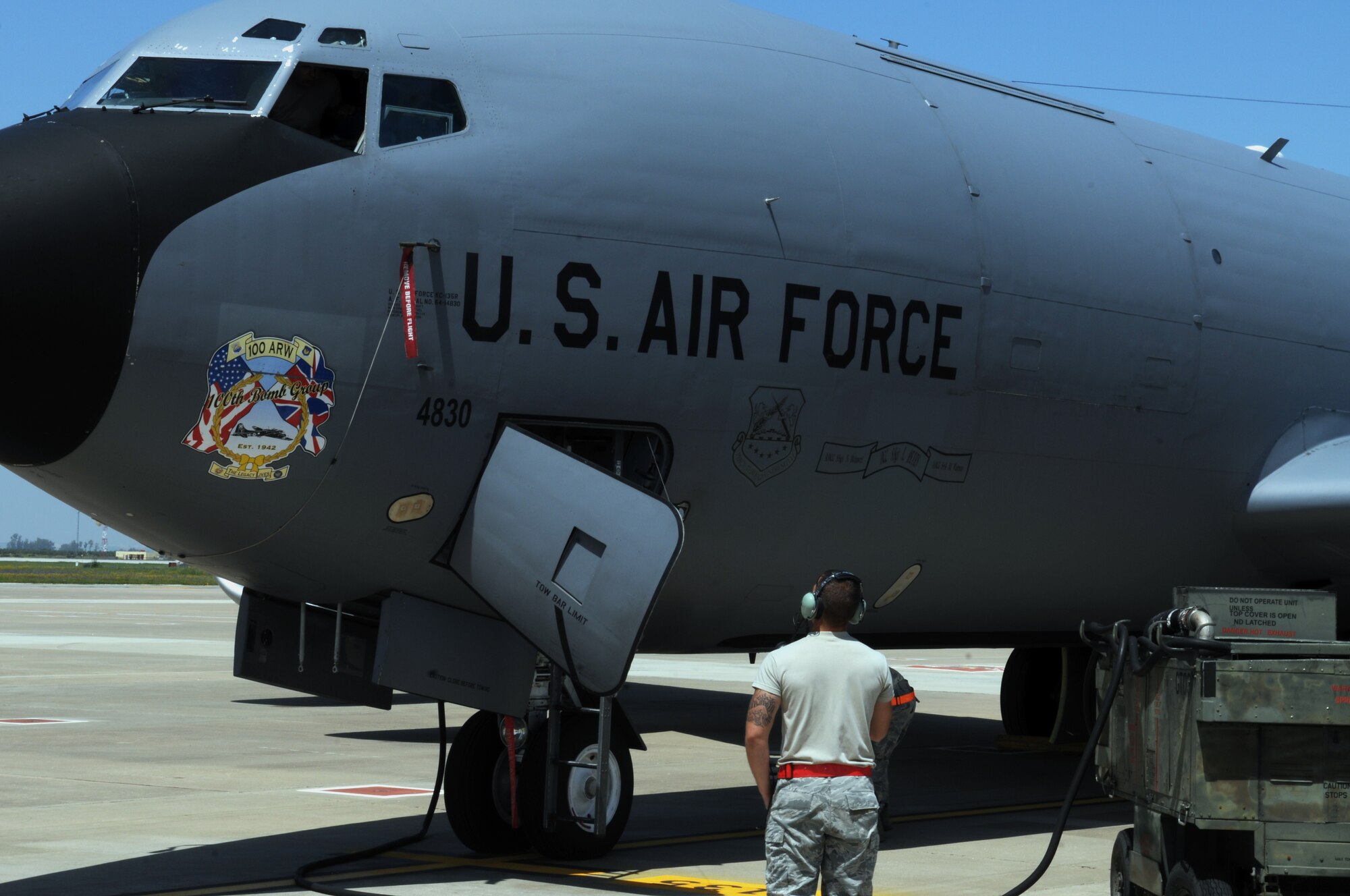 An Airman with the 100th Maintenance Squadron maintenance section monitors the external portion of the air cooling system on a KC-135 Stratotanker while deployed with the 351st Expeditionary Air Refueling Squadron April 18, 2013, in Southwest Europe. The system needed to be repaired to bring the in-flight climate-control back up to full capacity. (U.S. Air Force photo by 1st Lt. Christopher Mesnard/Released)