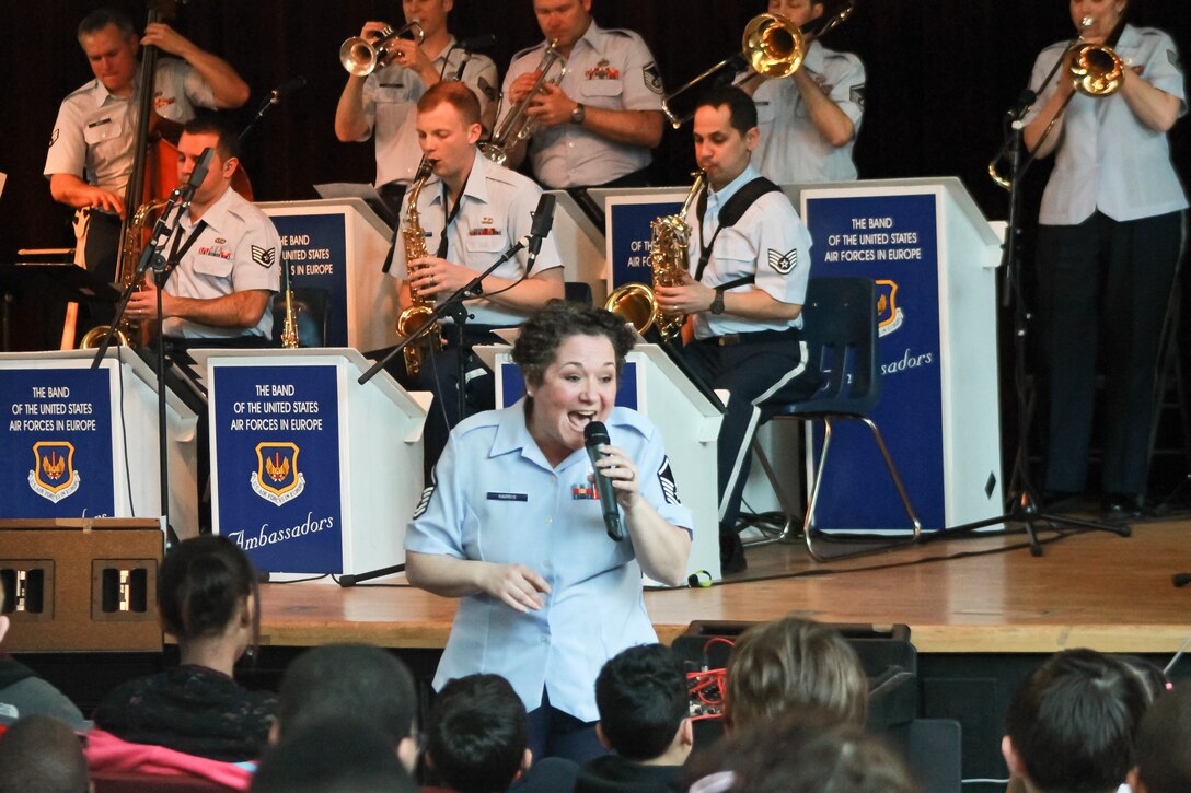MSgt Michelle Harris (featured) sings "My Funny Valentine" for Kaiserslautern Middle School.  The Ambassadors performed for four DODDS schools in honor of Music in Our Schools.