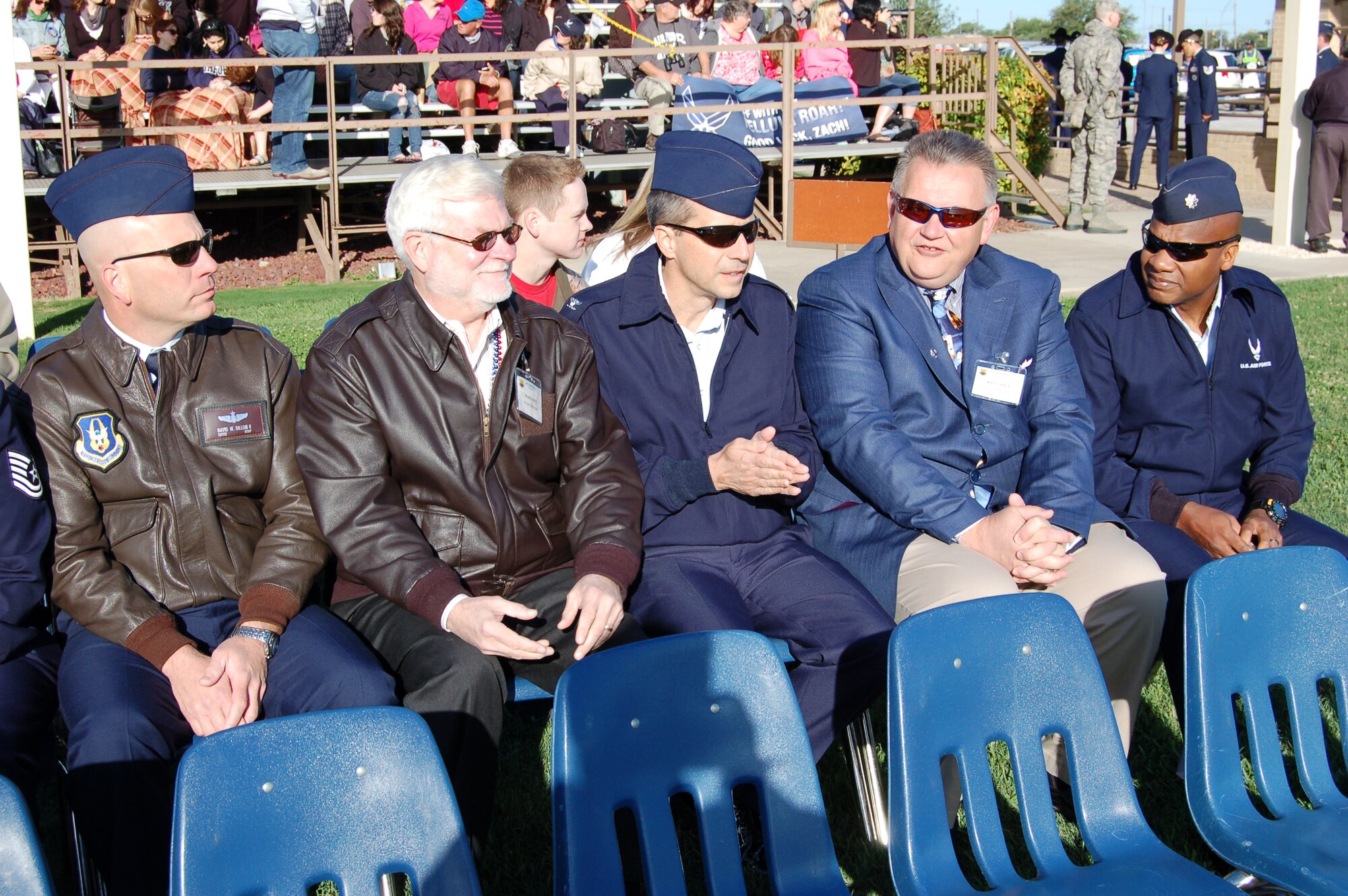 From left to right: Senior Master Sgt. Kevin Dillon, 733rd Training Squadron, Mark Frye, 733rd TRS Honorary Commander; Col. Jeffrey T. Pennington, 433rd Airlift Wing commander; Bill Gerlt, 433rd Airlift Control Flight Honorary Commander; and Lt. Col. Gordon Griggs, 433rd ALCF commander awaits the Joint Base San Antonio-Lackland's Fiesta Military Parade April 19. (U.S. Air Force Photo/Elsa Martinez)