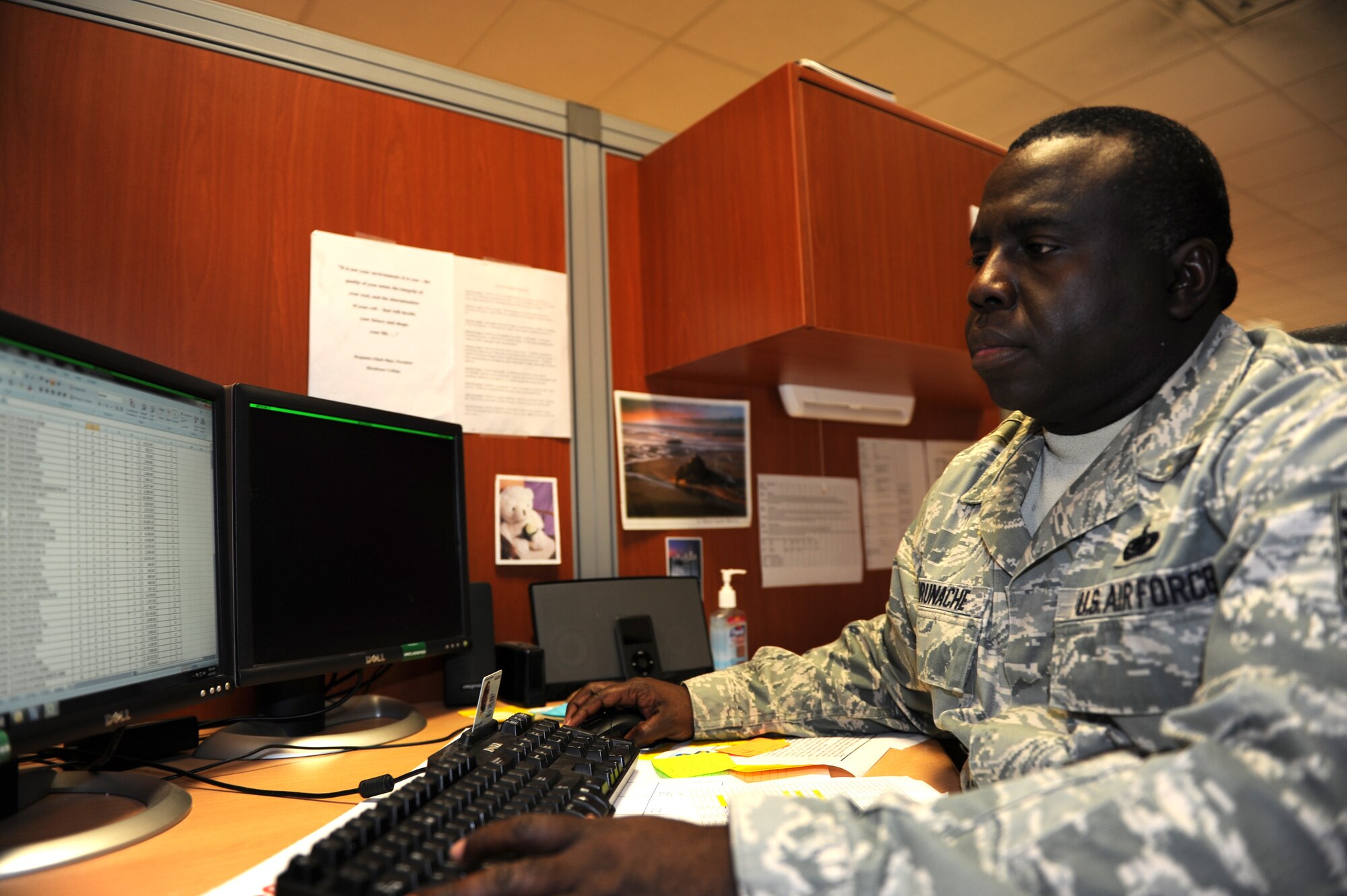 Tech. Sgt. Edward Brunache, 39th Logistics Readiness Squadron equipment management NCOIC, updates a listing of equipment accounts at Incirlik Air Base April 18, 2013. Equipment Management oversees a database covering 89 equipment accounts maintained by equipment custodians across Incirlik AB. (U.S. Air Force photo by Senior Airman Chase Hedrick/Released)