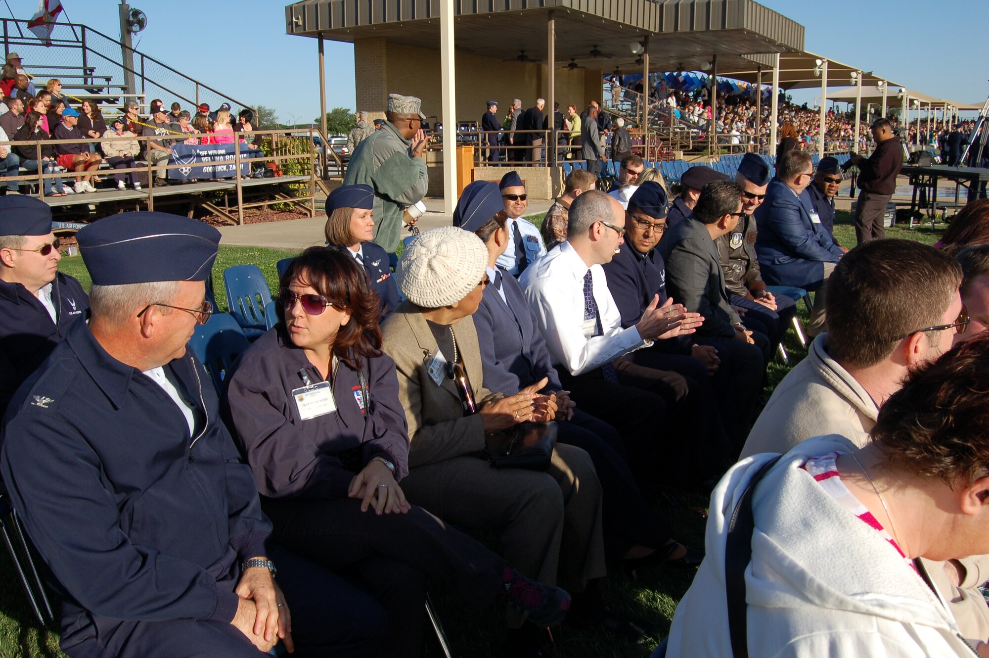 433rd Airlift Wing Honorary Commanders and wing leadership await the start of the Joint Base San Antonio-Lackland's Fiesta Military Parade, held April 19.  The parade is one of limited military events of Fiesta, a ten-day celebration which honors the memory of the fallen Alamo defenders. (U.S. Air Force Photo/Elsa Martinez)