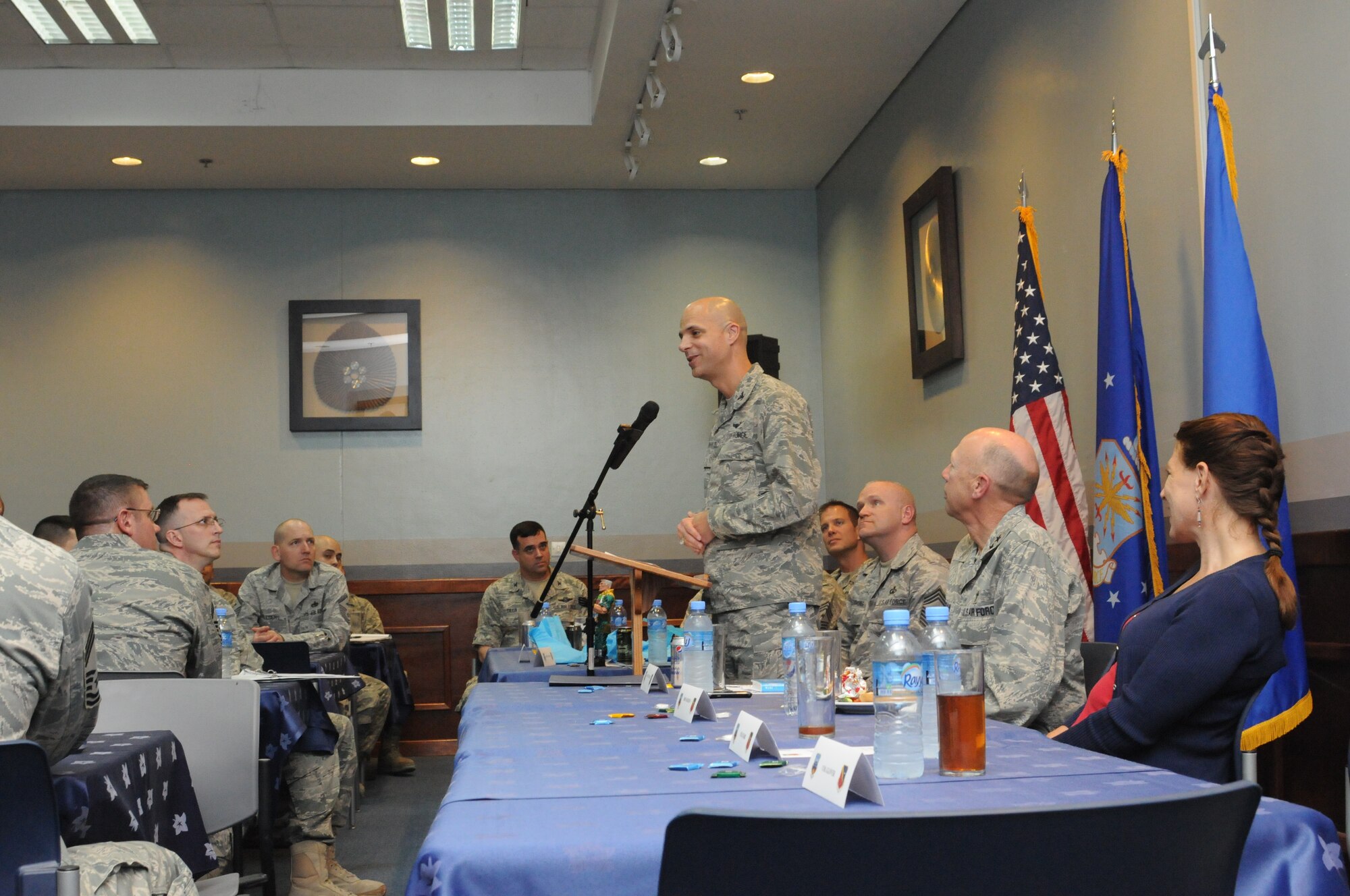 SOUTHWEST ASIA -- Col. Bob Starr, 379th Air Expeditionary Wing vice commander, introduces Air Force Chief of Chaplains Major General Howard Stendahl and Chaplain Assistant Career Field Manager Chief Master Sgt. Alton Clemmons during a religious luncheon April 14. Stendahl and Clemmons visited the 379th Air Expeditionary Wing April 14-15, speaking with Airmen and touring chaplain programs supporting operations here. Stendahl thanked various volunteer and religious groups for their support of Airmen deployed to Southwest Asia. (U.S. Air Force photo/Master Sgt. Christian Michael)
