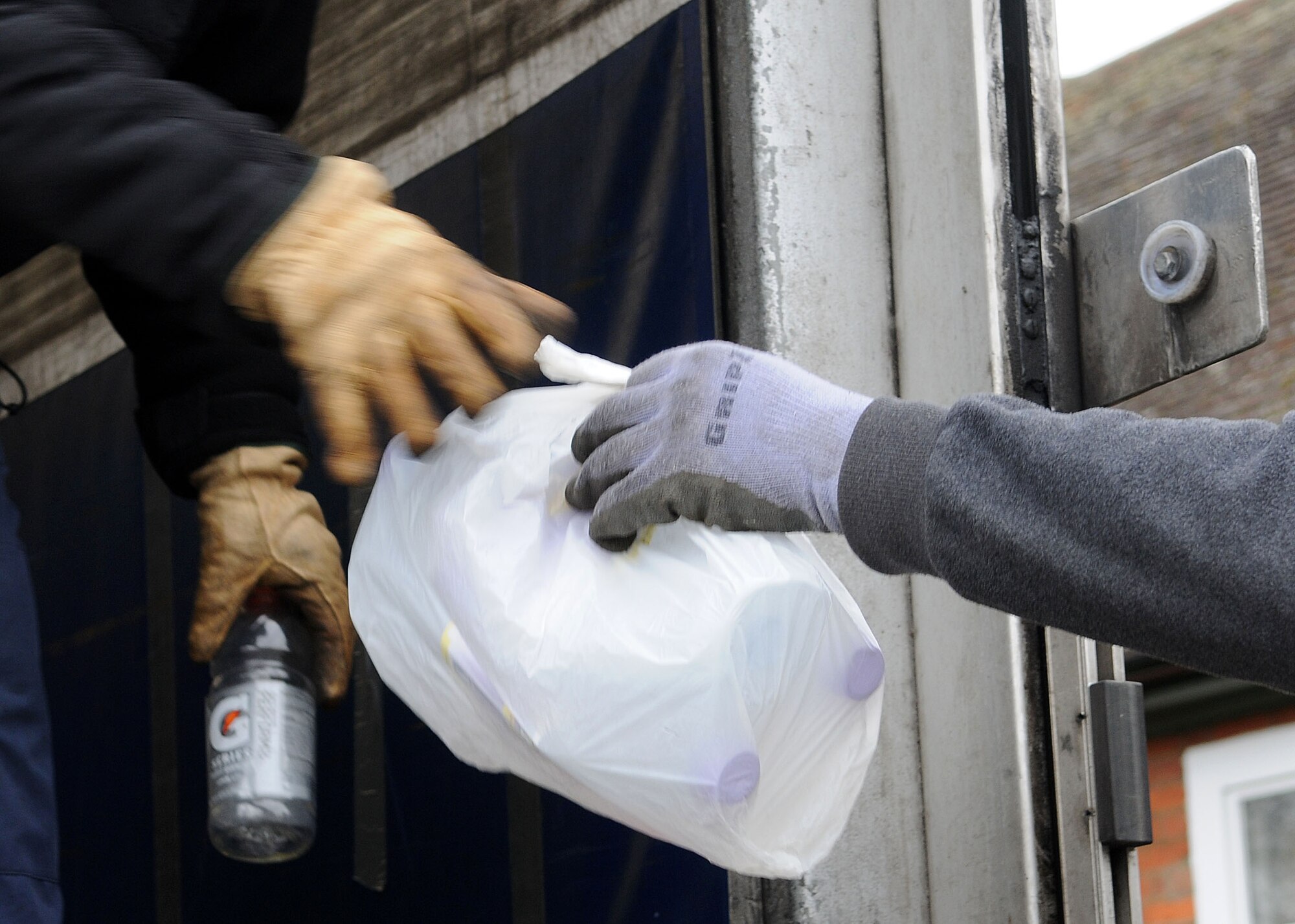 RAF Mildenhall Recycling Center personnel pick up recyclables April 17, 2013, at RAF Mildenhall, England. The center, located at building 818 near the south side gate, also accepts recycling drop off Monday to Thursday from 8 a.m. to 4:15 p.m. and Friday from 8 a.m. to 3:15 p.m. (U.S. Air Force photo by Staff Sgt. Tabitha M. Lee/Released)