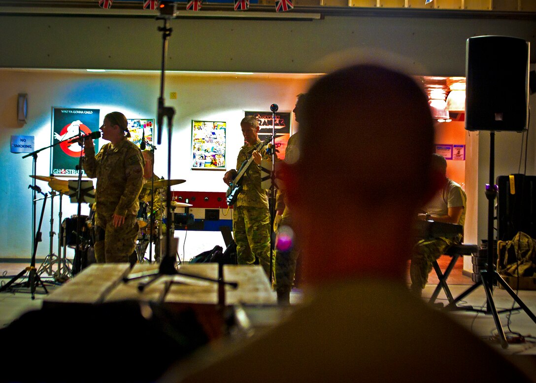 The Air Force Central Command Band “Vector” performs at the Hero’s Cafe on Kandahar Airfield, Afghanistan, April 16, 2013. (U.S. Air Force photo/Senior Airman Scott Saldukas)