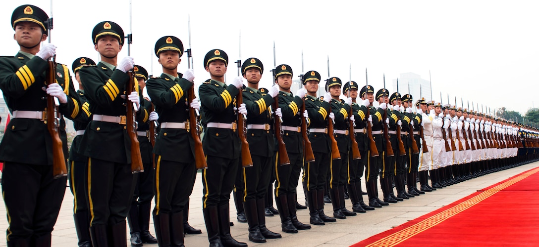 A Chinese honor guard renders honors during an honor cordon to welcome U.S. Army Gen. Martin E. Dempsey, chairman of the Joint Chiefs of Staff, in Beijing, April 22, 2013.