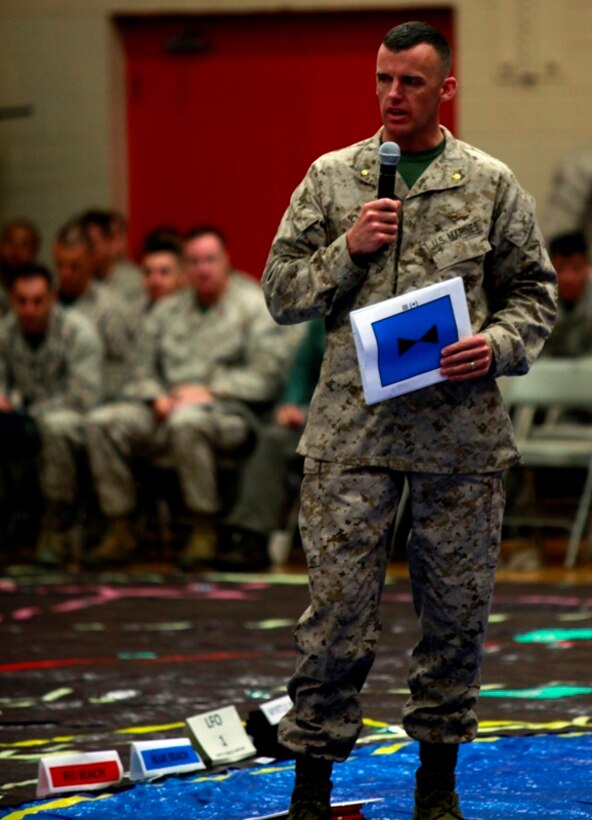 Maj. Jade Campbell, representing Marine Aircraft Group 29, briefs Marines, Sailors and coalition partners at a rehearsal of concept drill for Bold Alligator 2013 at Camp Allen Norfolk, Va., April 20. Bold Alligator 13 is a synthetic, scenario-driven exercise designed to train staffs primarily from 2d Marine Expeditionary Brigade and Expeditionary Strike Group 2 in an effort to continue revitalizing and improving their ability to integrate and execute large-scale operations from the sea. The scale of this operation dwarfs a standard Marine Expeditionary Unit-Amphibious Ready Group team, which includes three amphibious assault ships with approximately 2,300 Marines and 2,000 Sailors embarked.