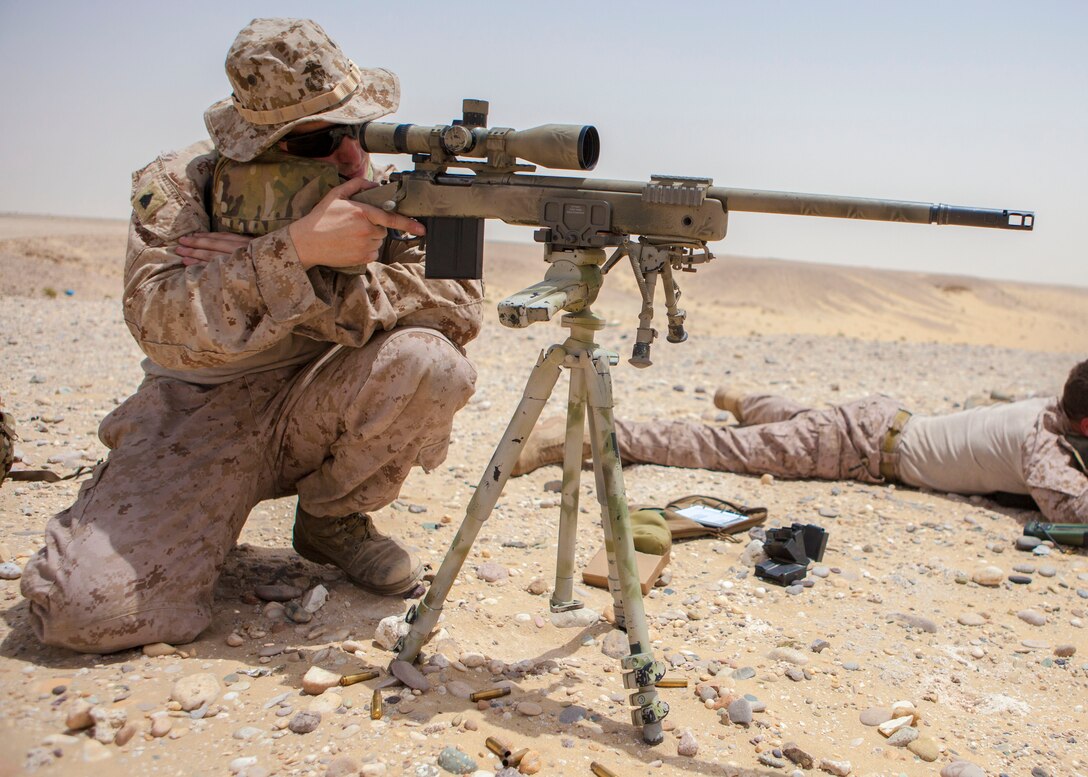 A 26th Marine Expeditionary Unit (MEU) Maritime Raid Force Marines fires a M40A5 sniper rifle while conducting a marksmanship training exercise at a range in Qatar, April 22, 2013. Eagle Resolve is an annual multilateral exercise designed to enhance regional cooperative defense efforts of the Gulf Cooperation Council nations and U.S. Central Command. The 26th MEU is deployed to the 5th Fleet area of operations aboard the Kearsarge Amphibious Ready Group. The 26th MEU operates continuously across the globe, providing the president and unified combatant commanders with a forward-deployed, sea-based quick reaction force. The MEU is a Marine Air-Ground Task Force capable of conducting amphibious operations, crisis response and limited contingency operations. (U.S. Marine Corps photo by Cpl. Christopher Q. Stone, 26th MEU Combat Camera/Released)