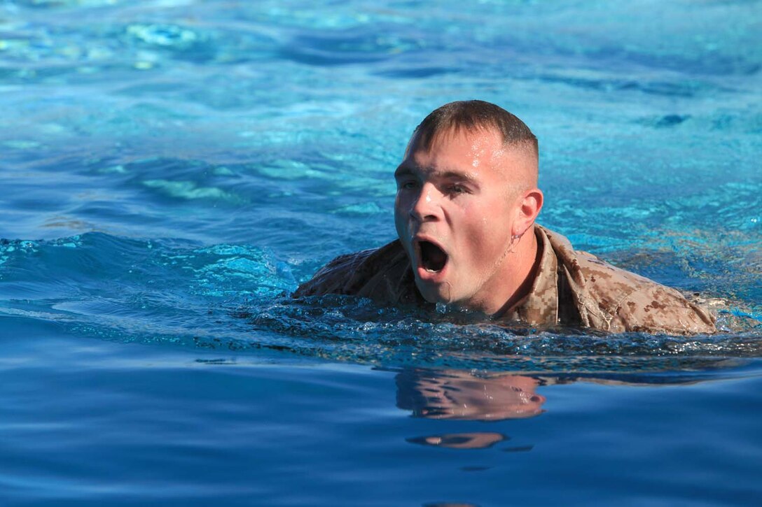 Sgt. Jeremy Teft, assistance operations chief with 1st Intelligence Battalion, participates in the 500-meter swim in the I Marine Expeditionary Force Commander's Cup tournament at Camp Pendleton, Calif., April 18. The Commander's Cup consists of seven challenges over the course of seven months. The final challenge will take place next month, where the winning battalion will be announced. Teft, 26, is from Richmond, R.I.
