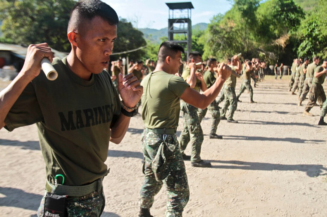 Marines with the Philippine Marine Corps practice knife techniques alongside U.S. Marines and Sailors with Company B., Battalion Landing Team 1st Battalion, 5th Marines, 31st Marine Expeditionary Unit, as a part of exercise Balikatan 2013 in Ternate, Philippines, April 10. As treaty allies, the Armed Forces of the Philippines and U.S. military have a longstanding relationship that has contributed to regional security and stability. The 31st MEU is the only continuously forward-deployed MEU and is the Marine Corps’ force in readiness in the Asia-Pacific region.